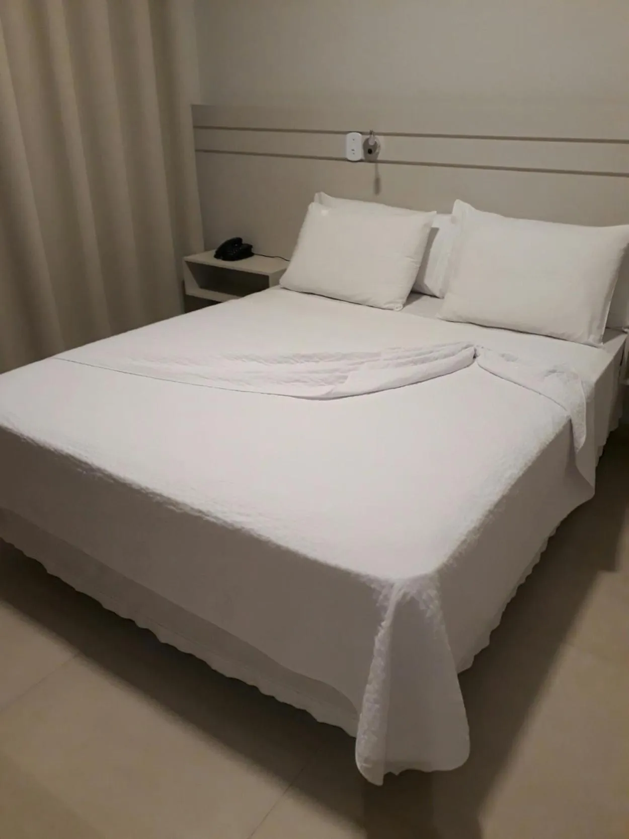 Bed in Pak Suítes Hotel