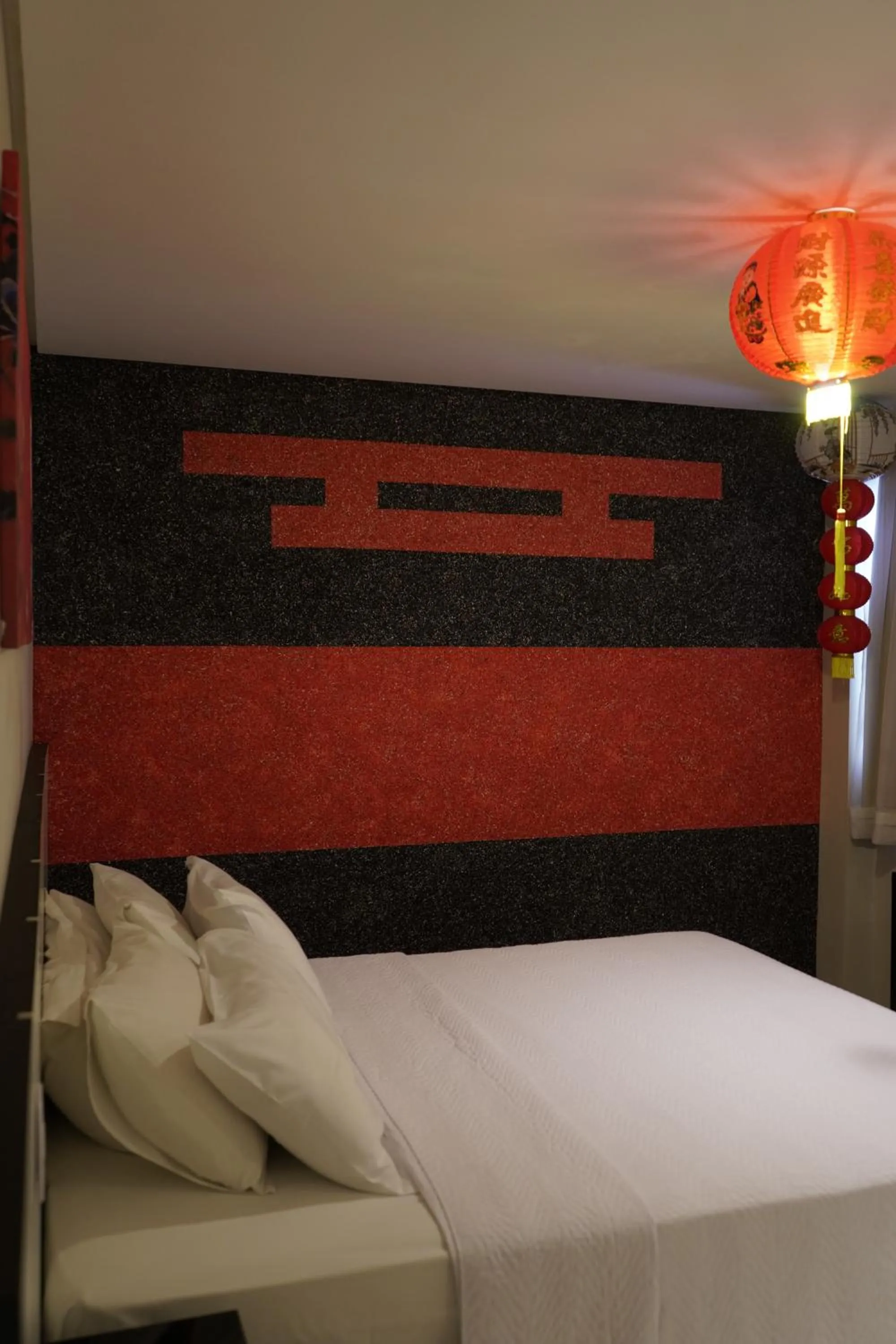 Bed in Pak Suítes Hotel