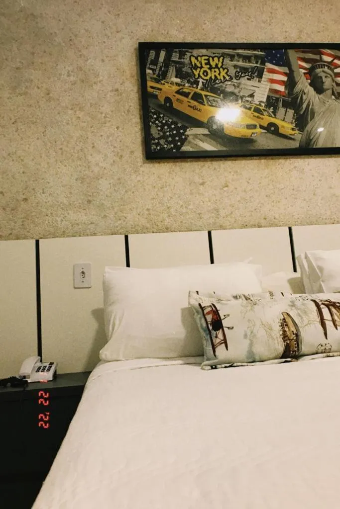 Bed in Pak Suítes Hotel