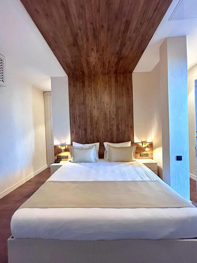 Bed in Sky Tower King Hotel