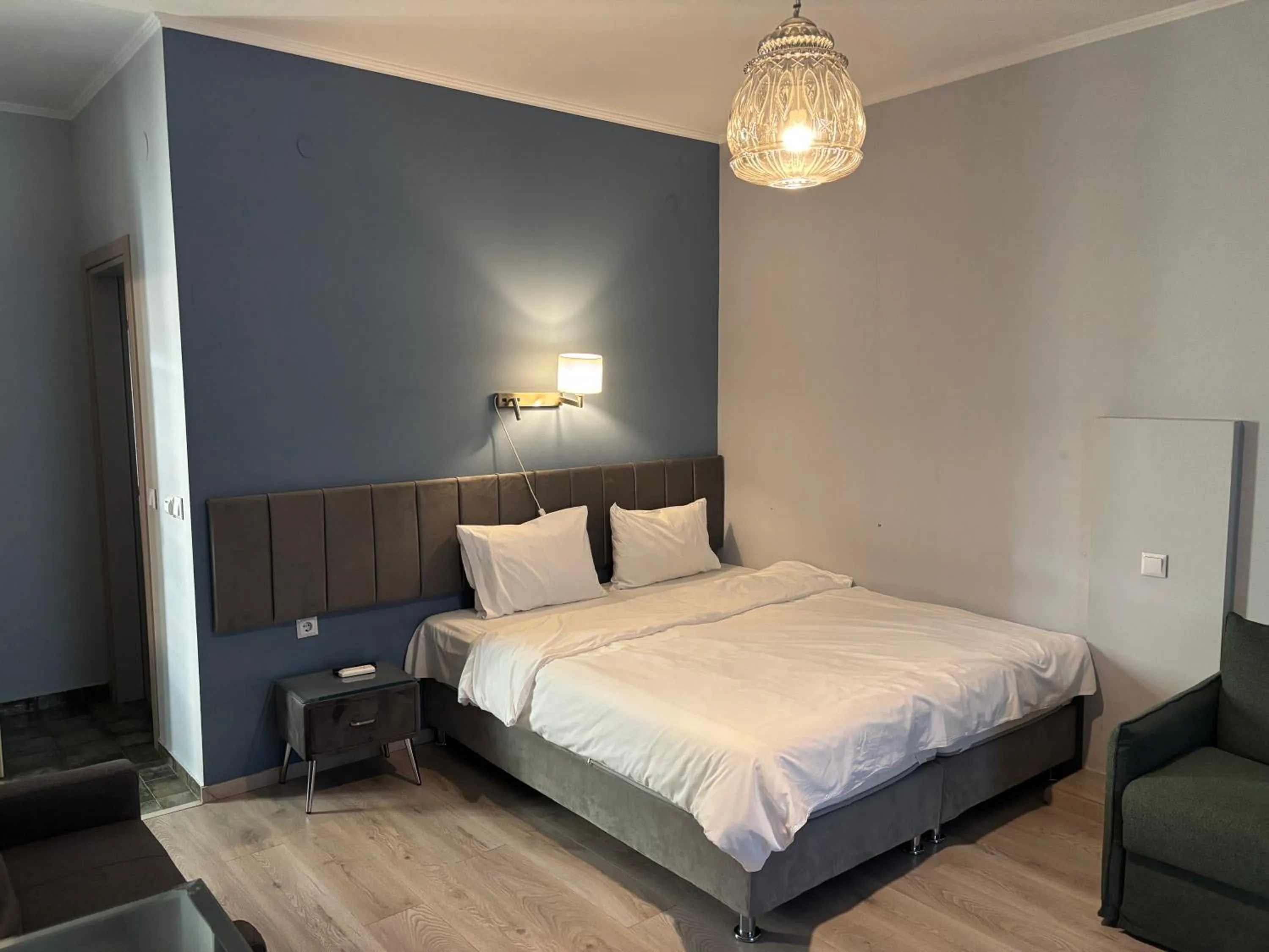 Bed in Le Bijou Luxury Rooms & Suites