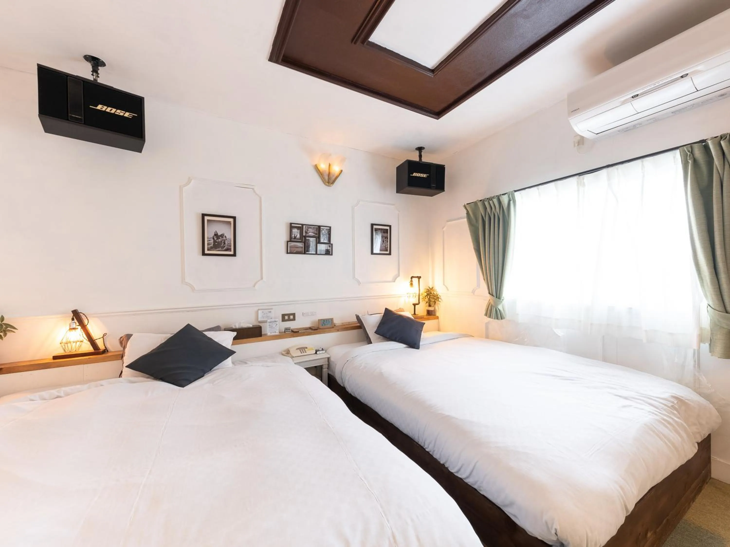 Bed in Tabist Hotel Nizi Fuefuki Misaka