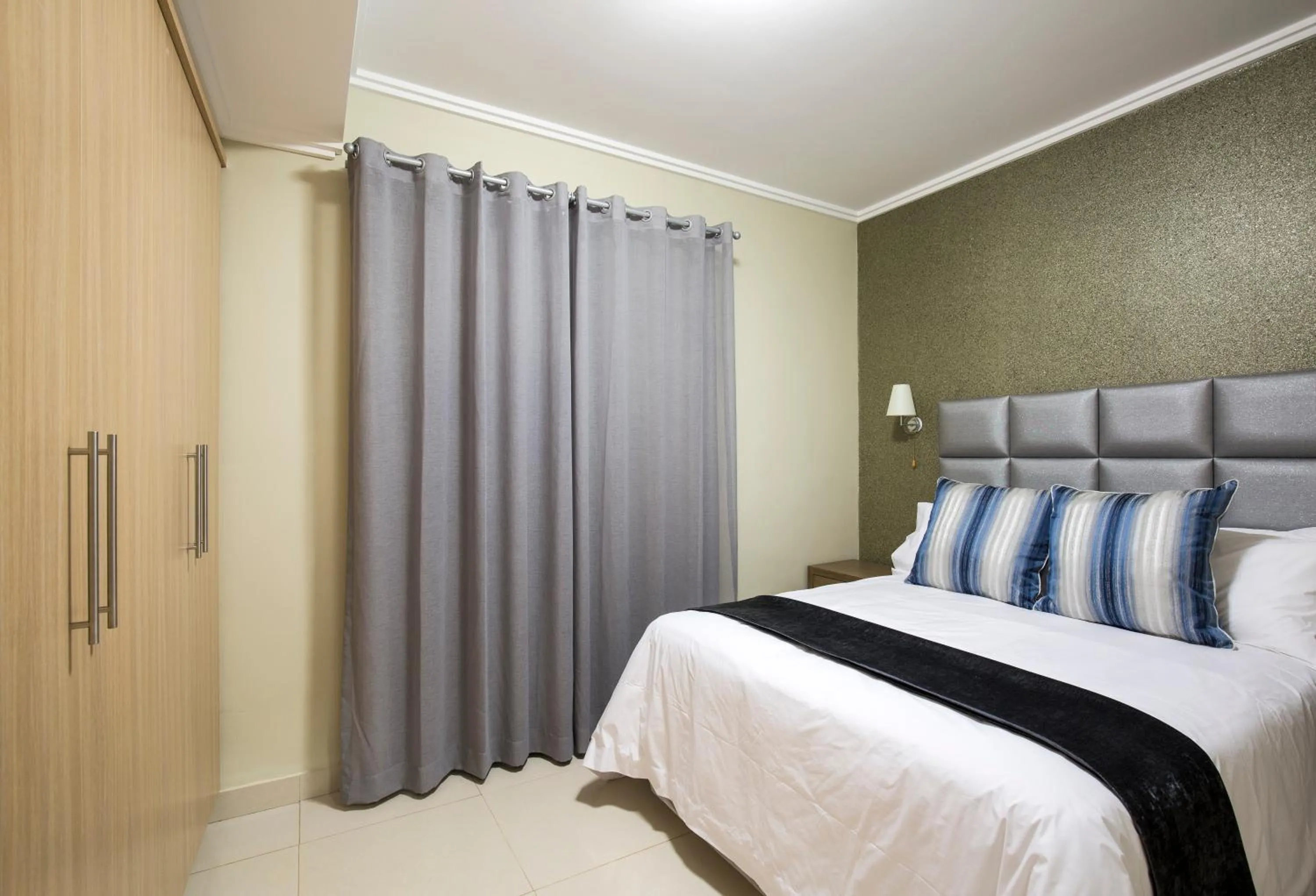 Bed in Savannah Park Luxury Apartments