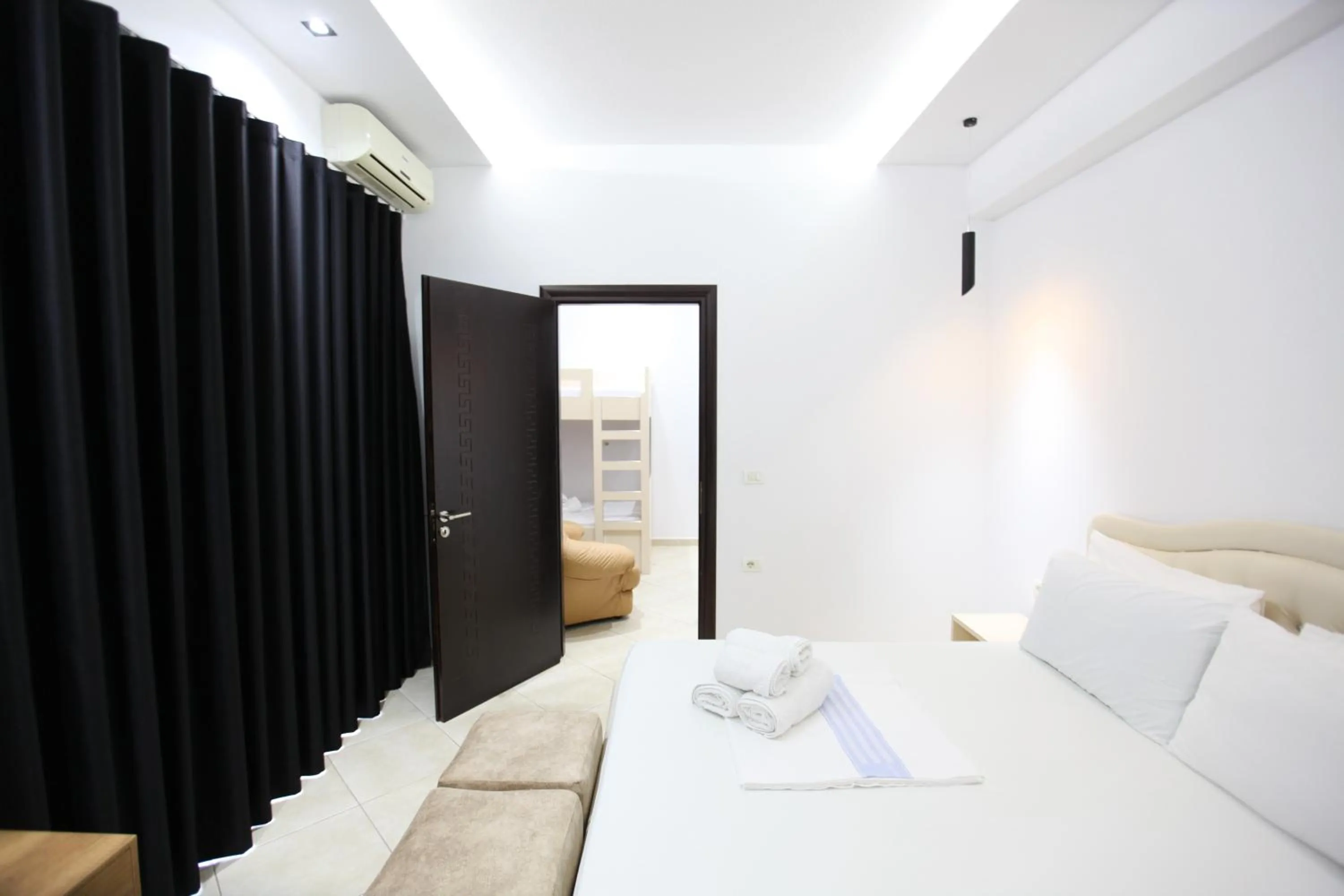 Bed in Ksamil Central Park Hotel