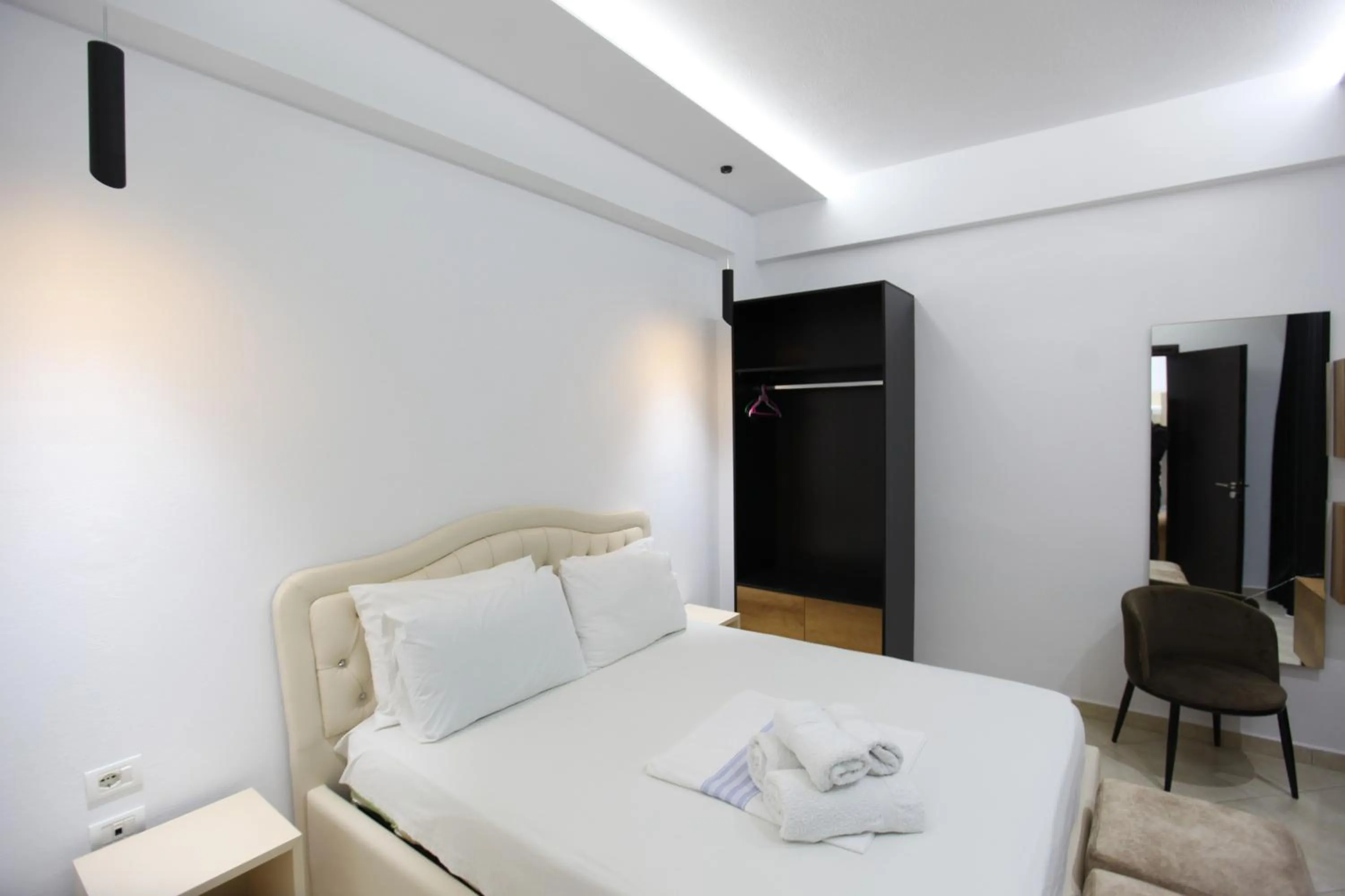 Bed in Ksamil Central Park Hotel