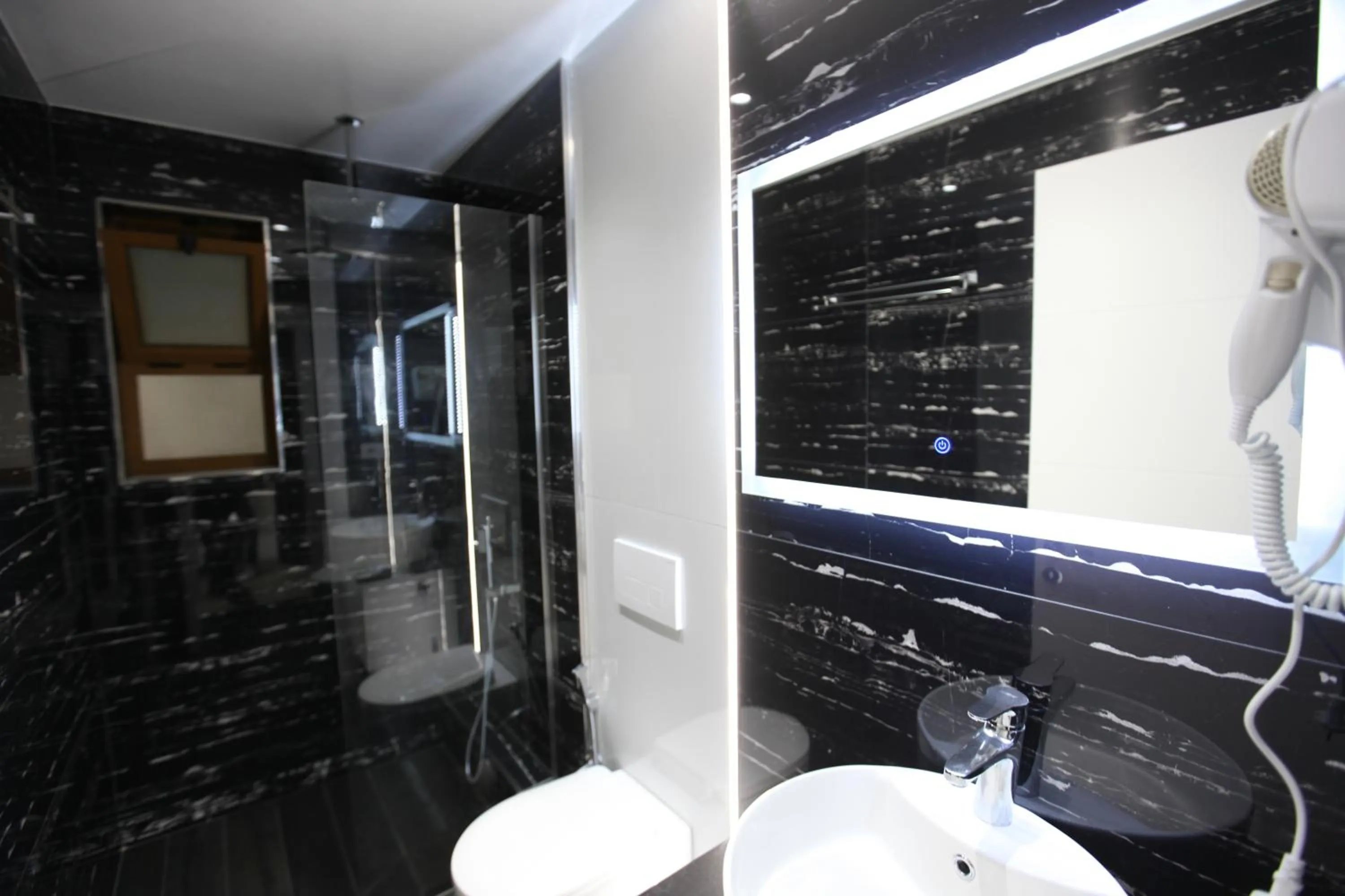 Bathroom in Ksamil Central Park Hotel