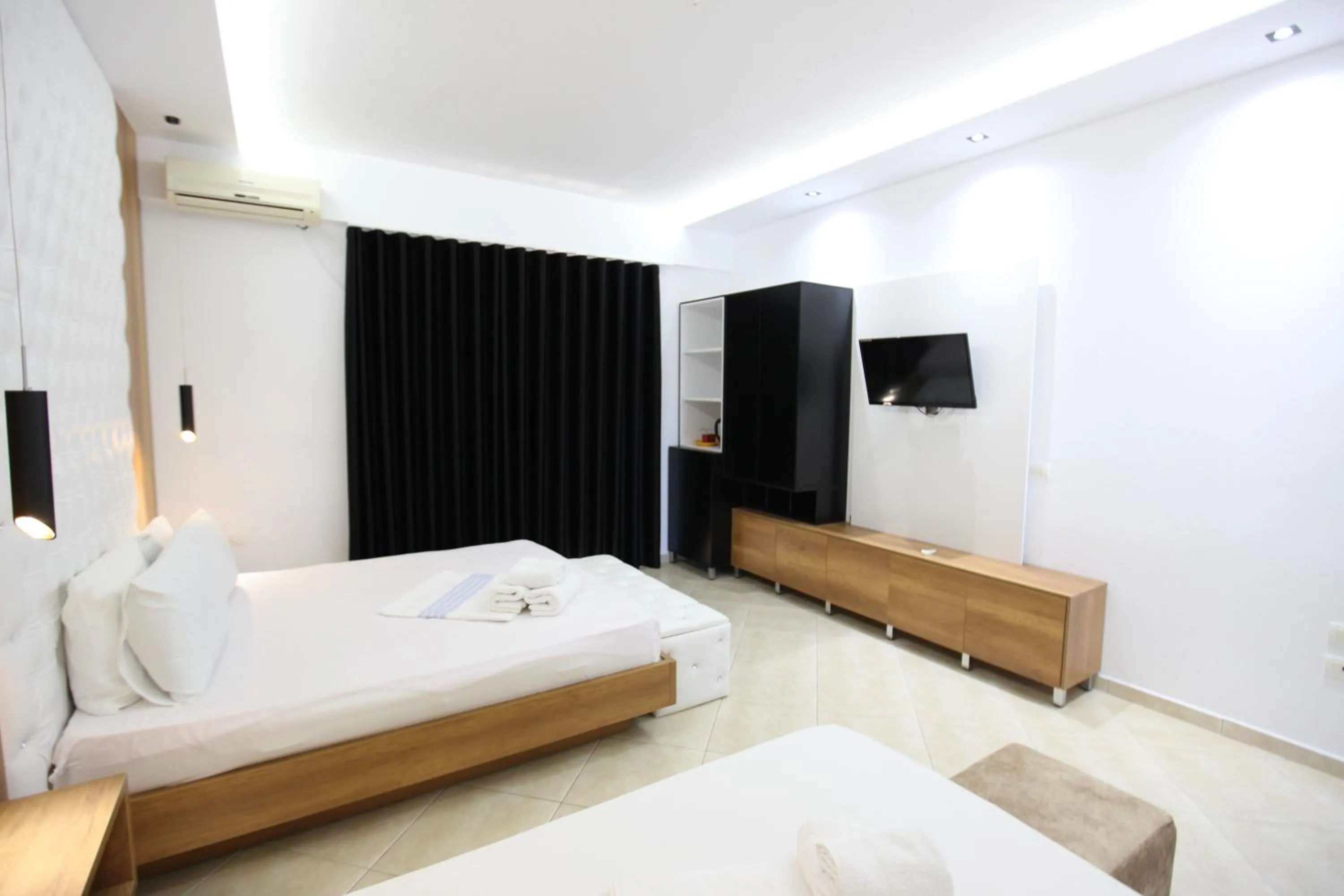 Photo of the whole room, Bed in Ksamil Central Park Hotel