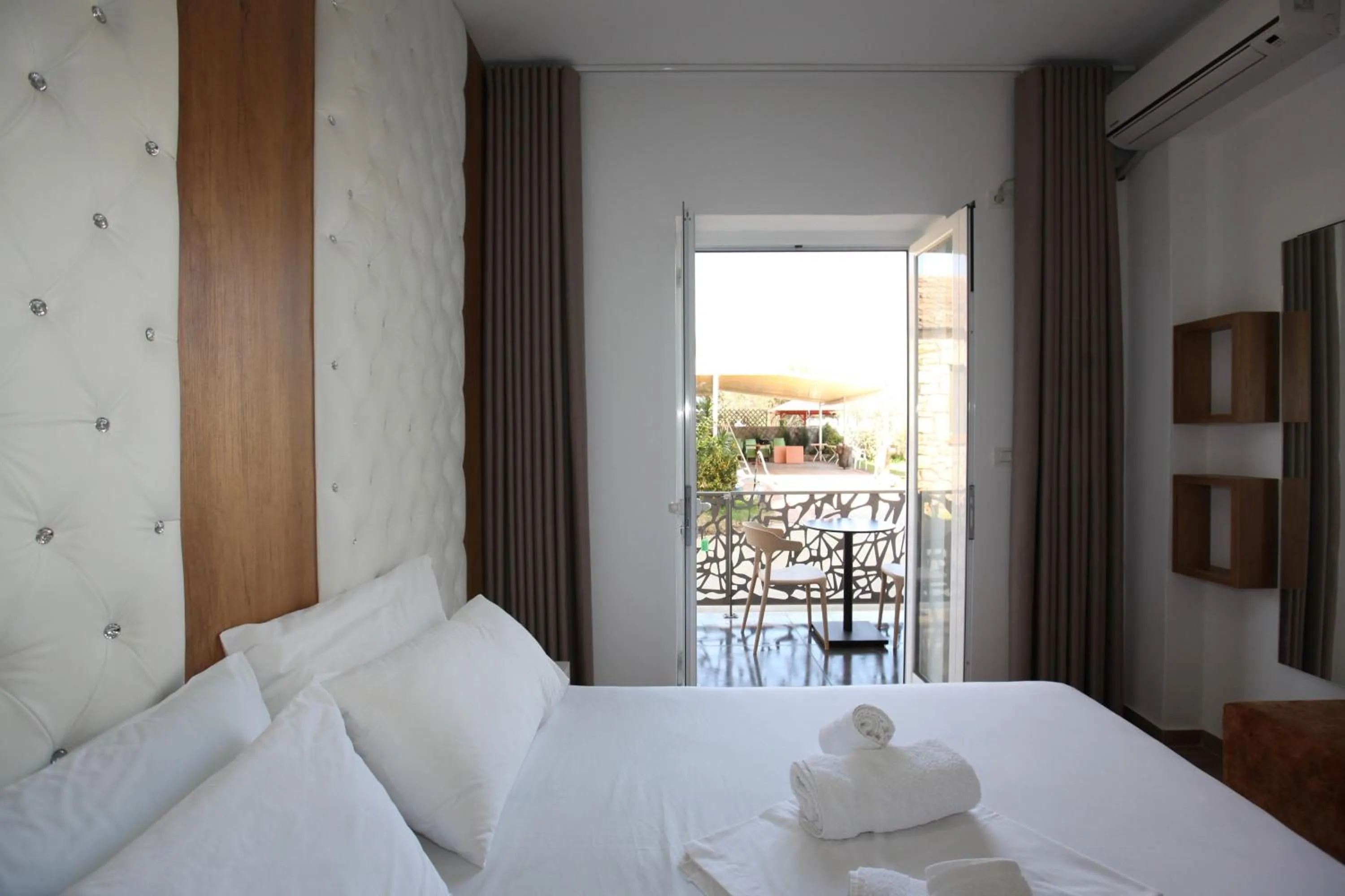 Bed in Ksamil Central Park Hotel