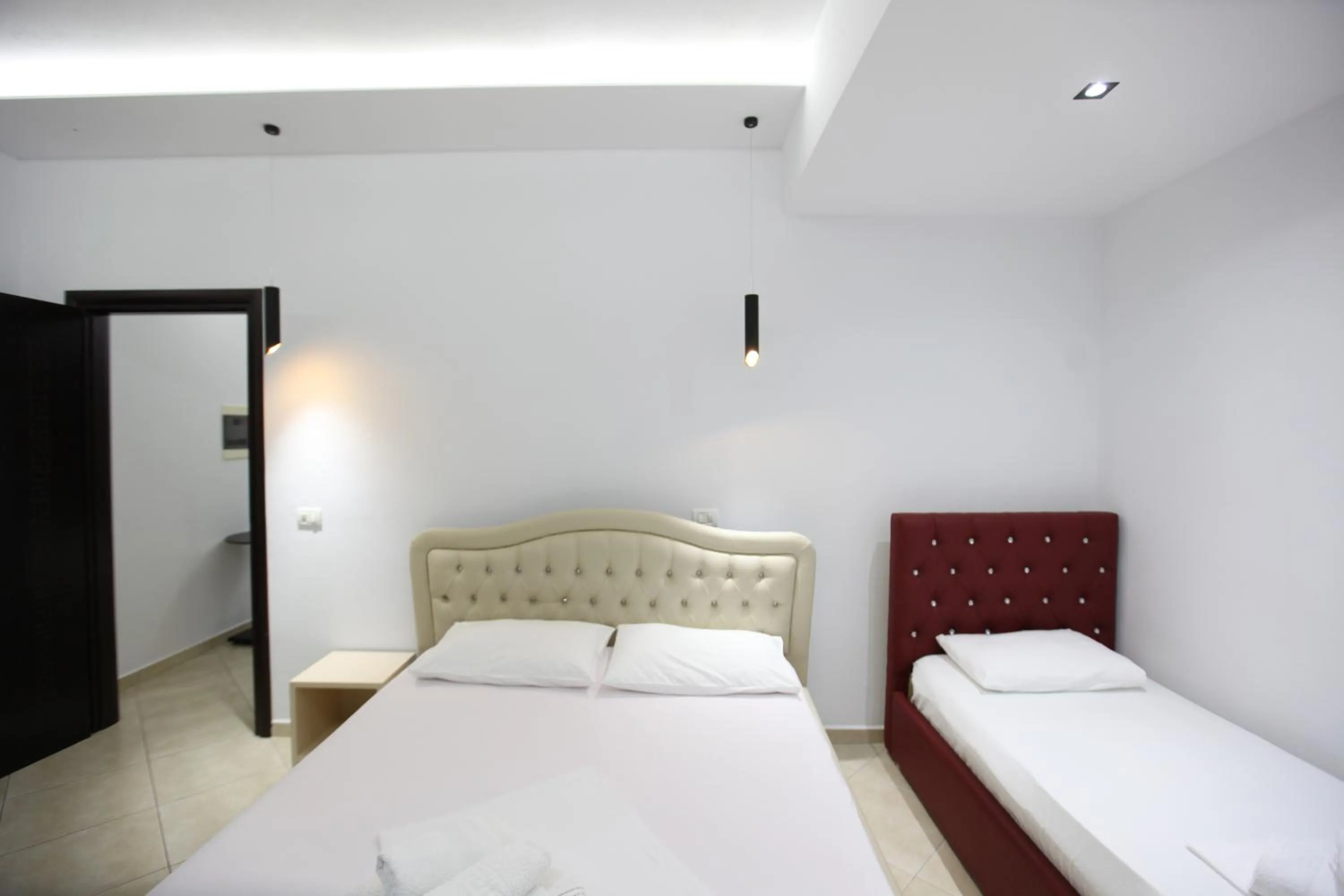 Bed in Ksamil Central Park Hotel