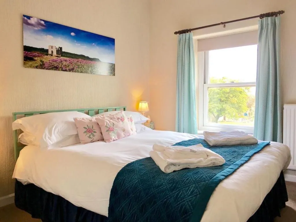 Bed in The Horseshoe Country Inn