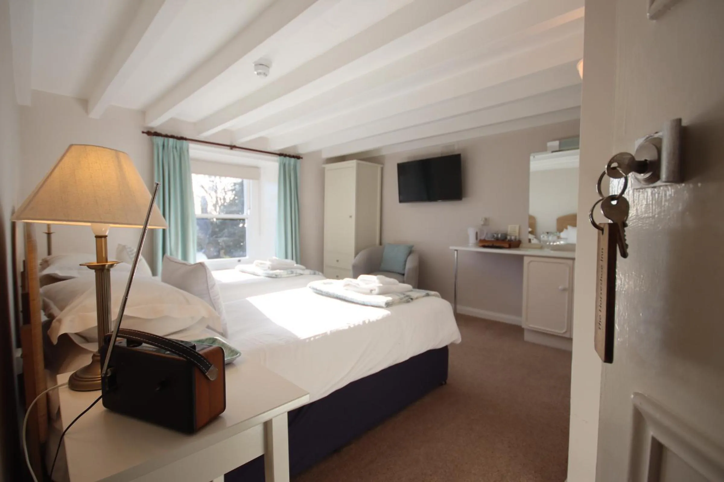 Bed in The Horseshoe Country Inn