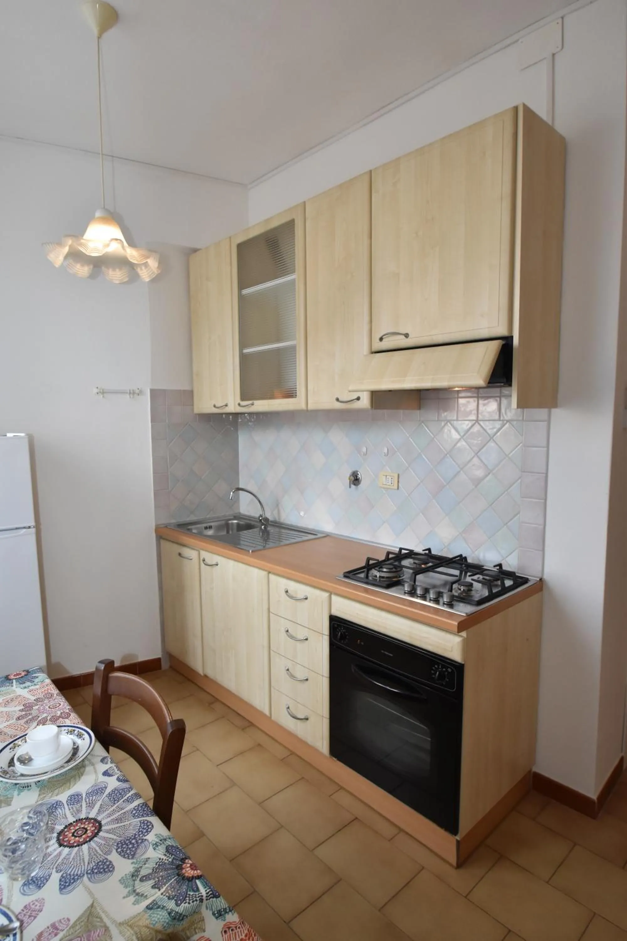 Kitchen or kitchenette in Appartamenti Olivo - 100 mt dal mare con aria condizionata