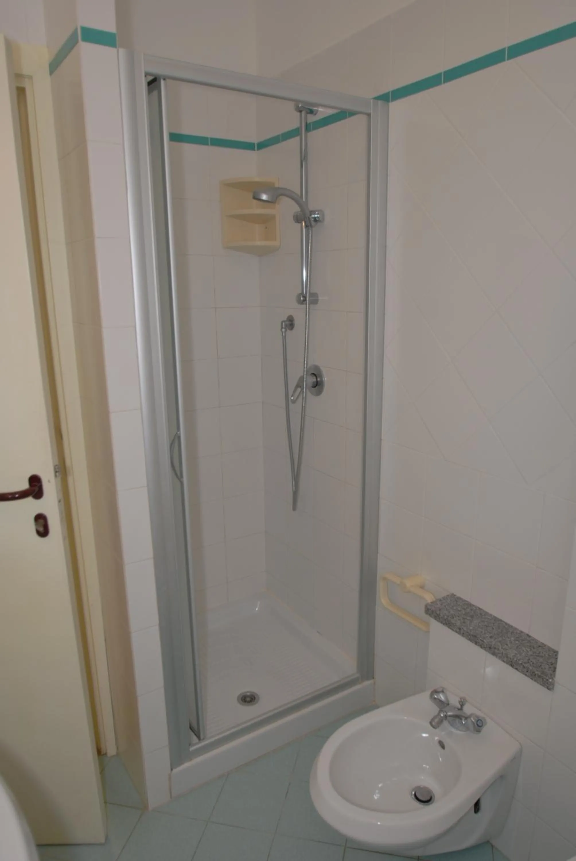 Bathroom in Appartamenti Olivo - 100 mt dal mare con aria condizionata