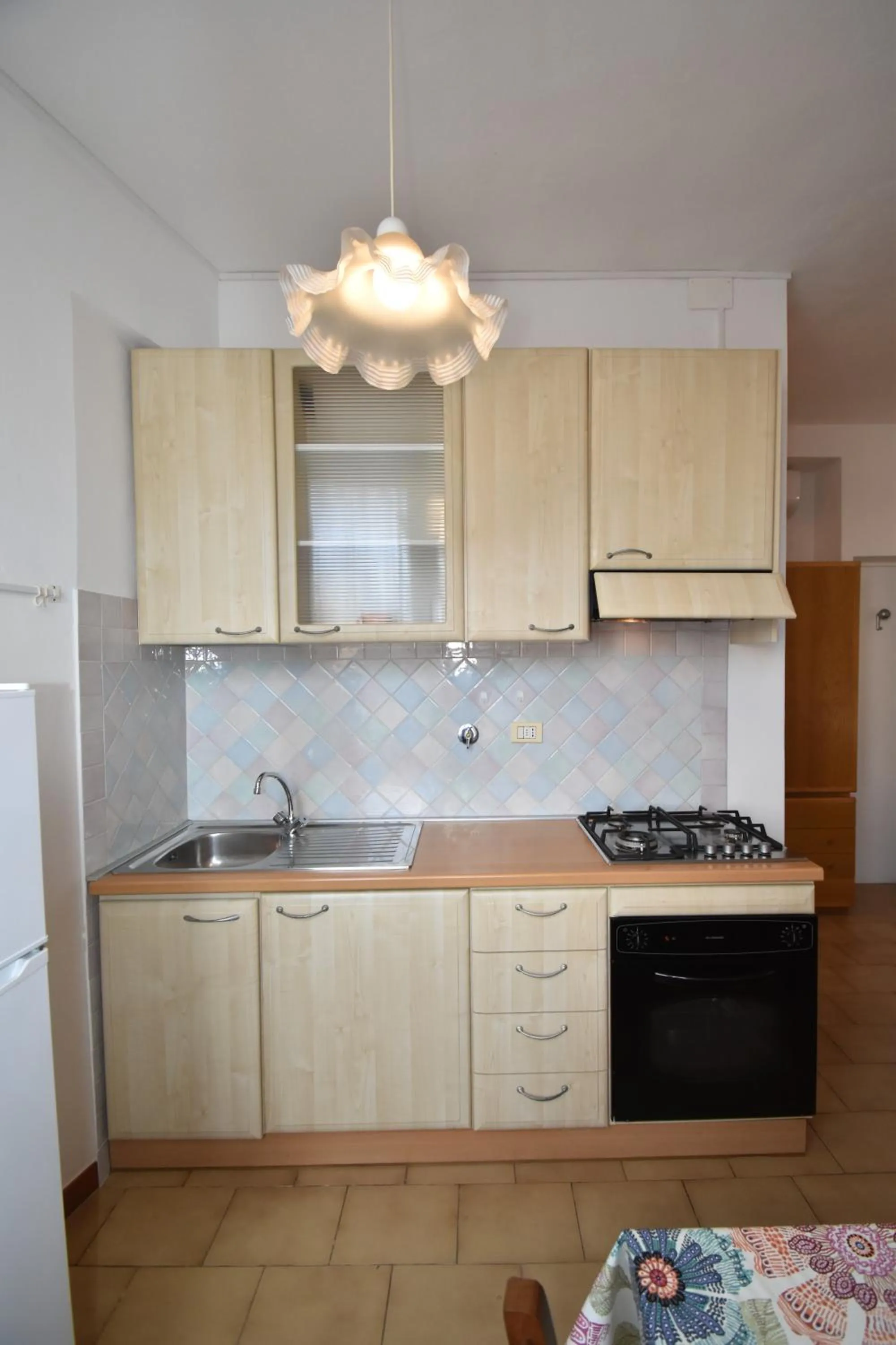 Kitchen or kitchenette in Appartamenti Olivo - 100 mt dal mare con aria condizionata