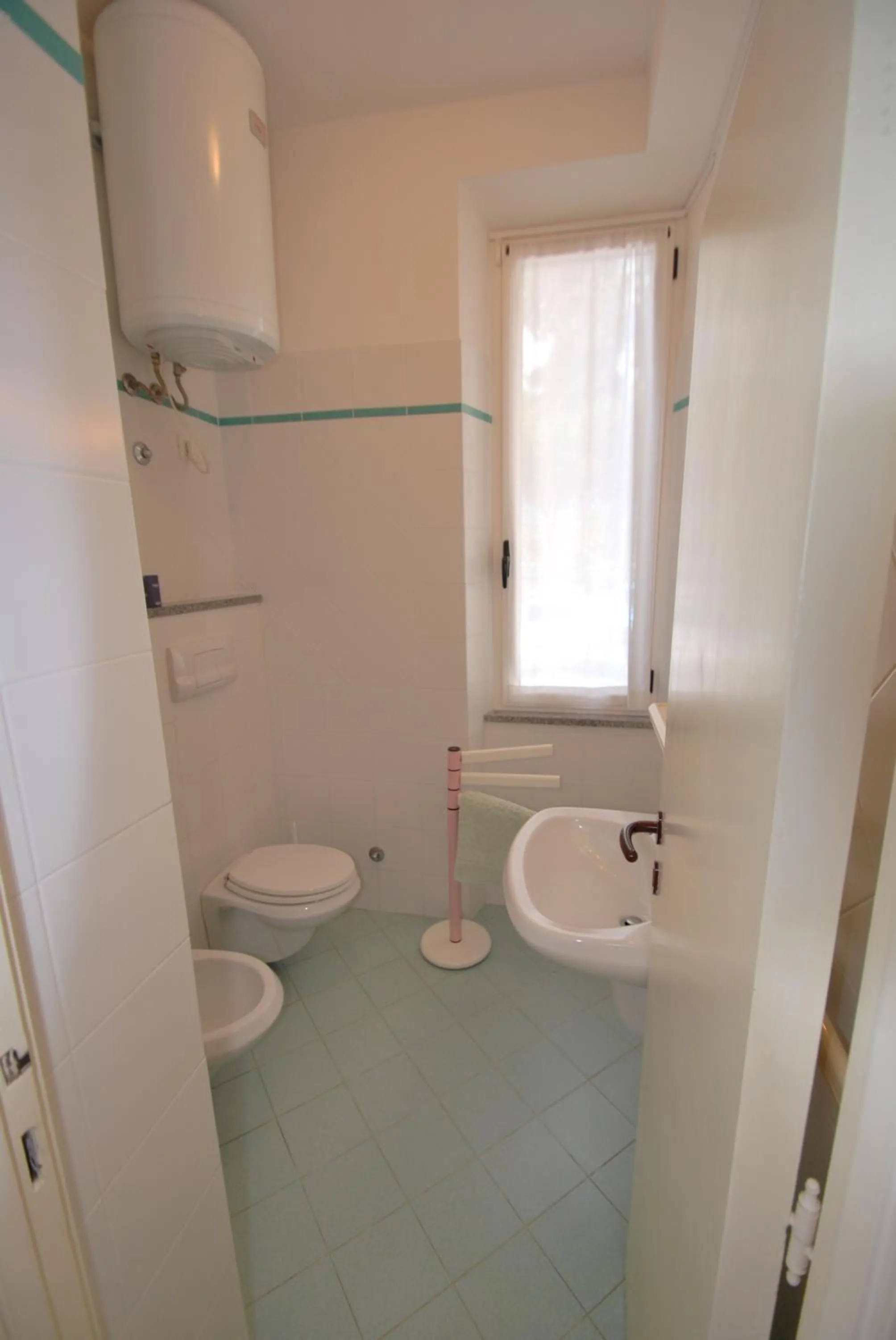 Bathroom in Appartamenti Olivo - 100 mt dal mare con aria condizionata