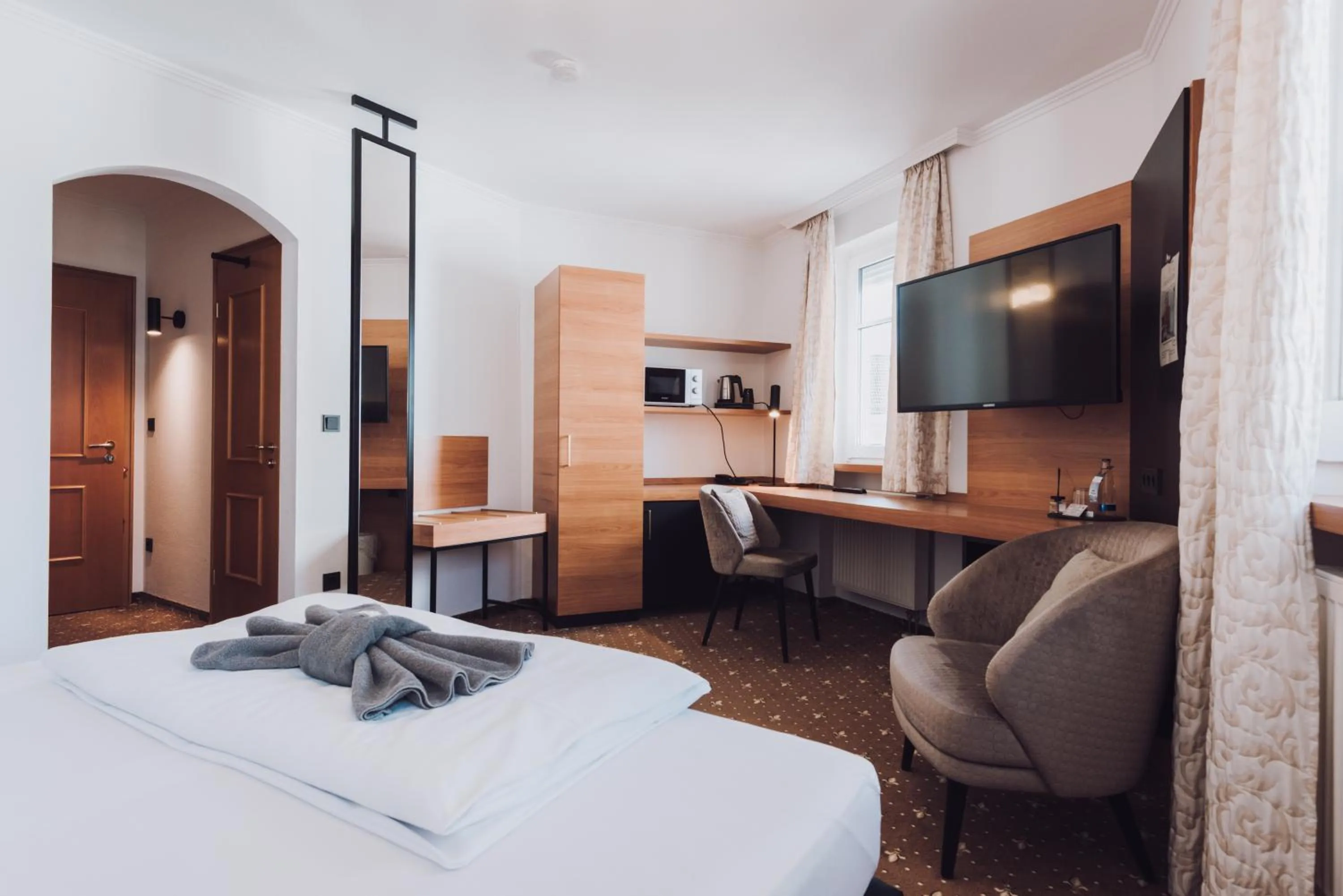 TV and multimedia, Bed in Ambienthotel Tassilo