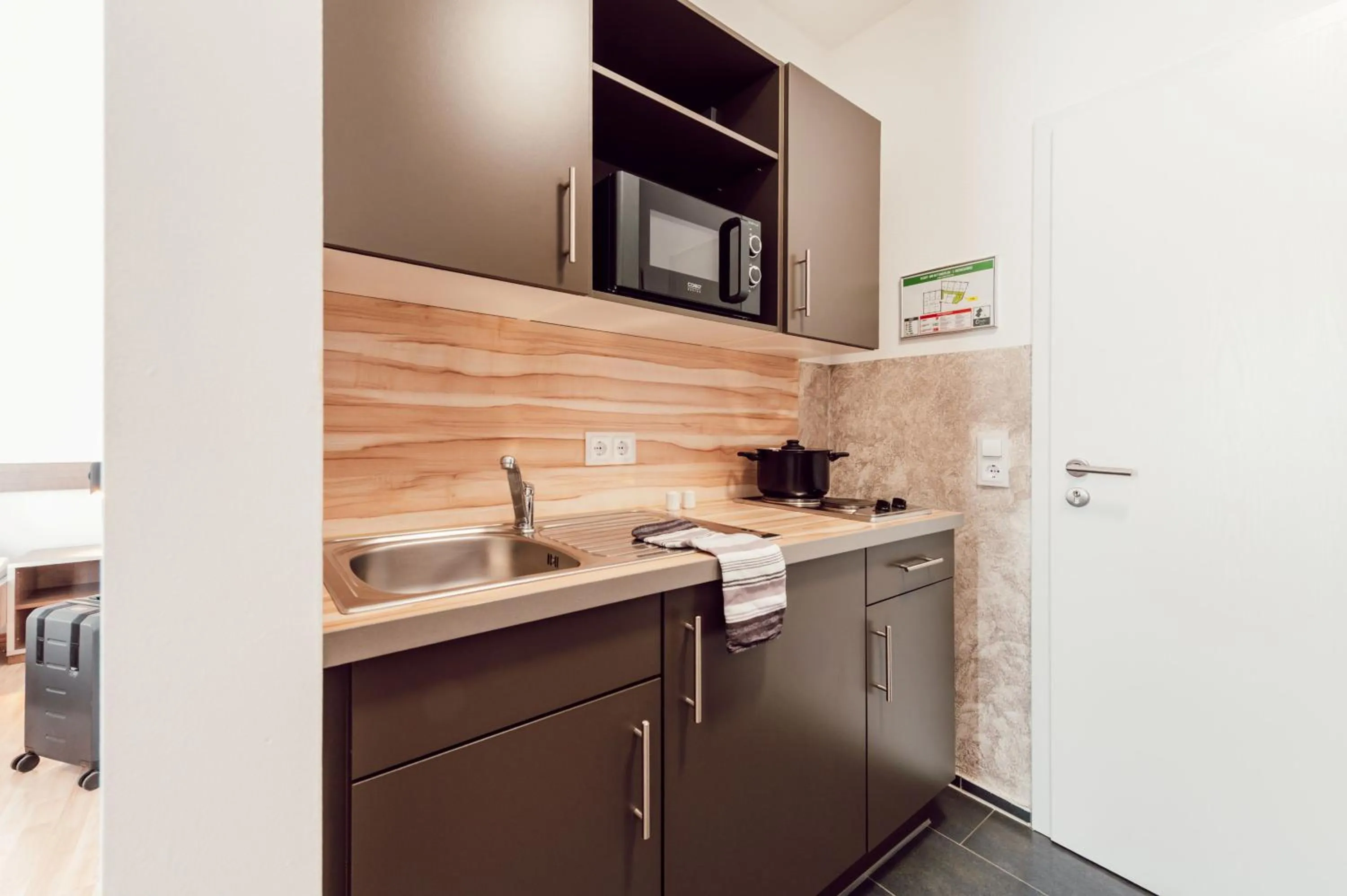 Kitchen or kitchenette in Aparthotel Othello