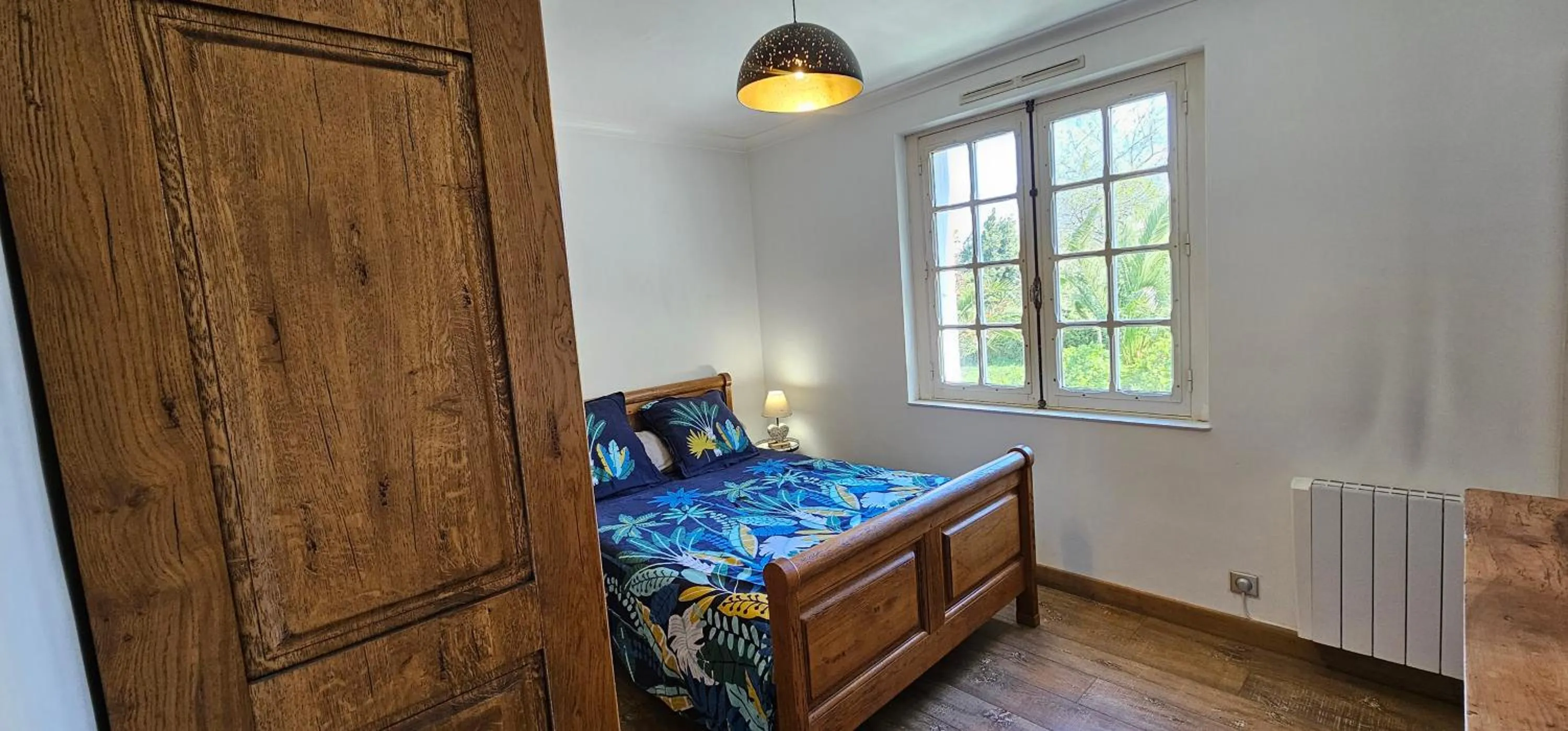 Bed in Chez Renée et Raynal B&B