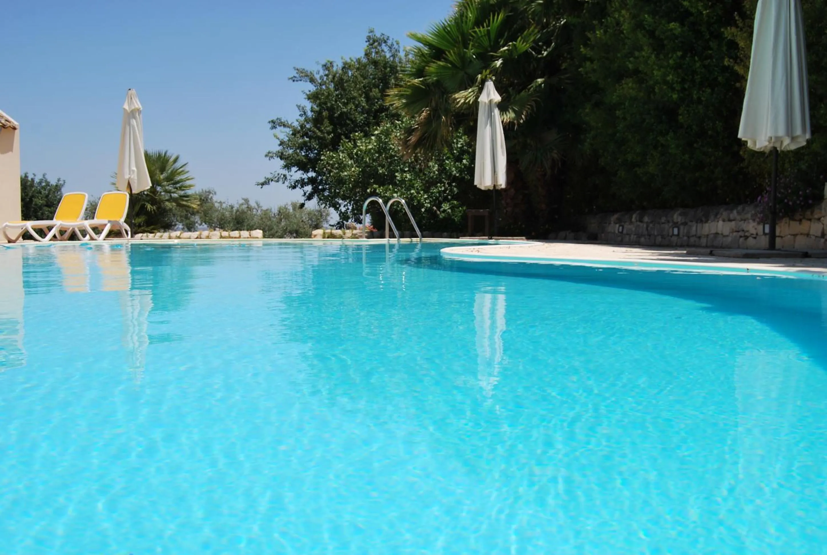 Swimming pool in Relais Torre Marabino