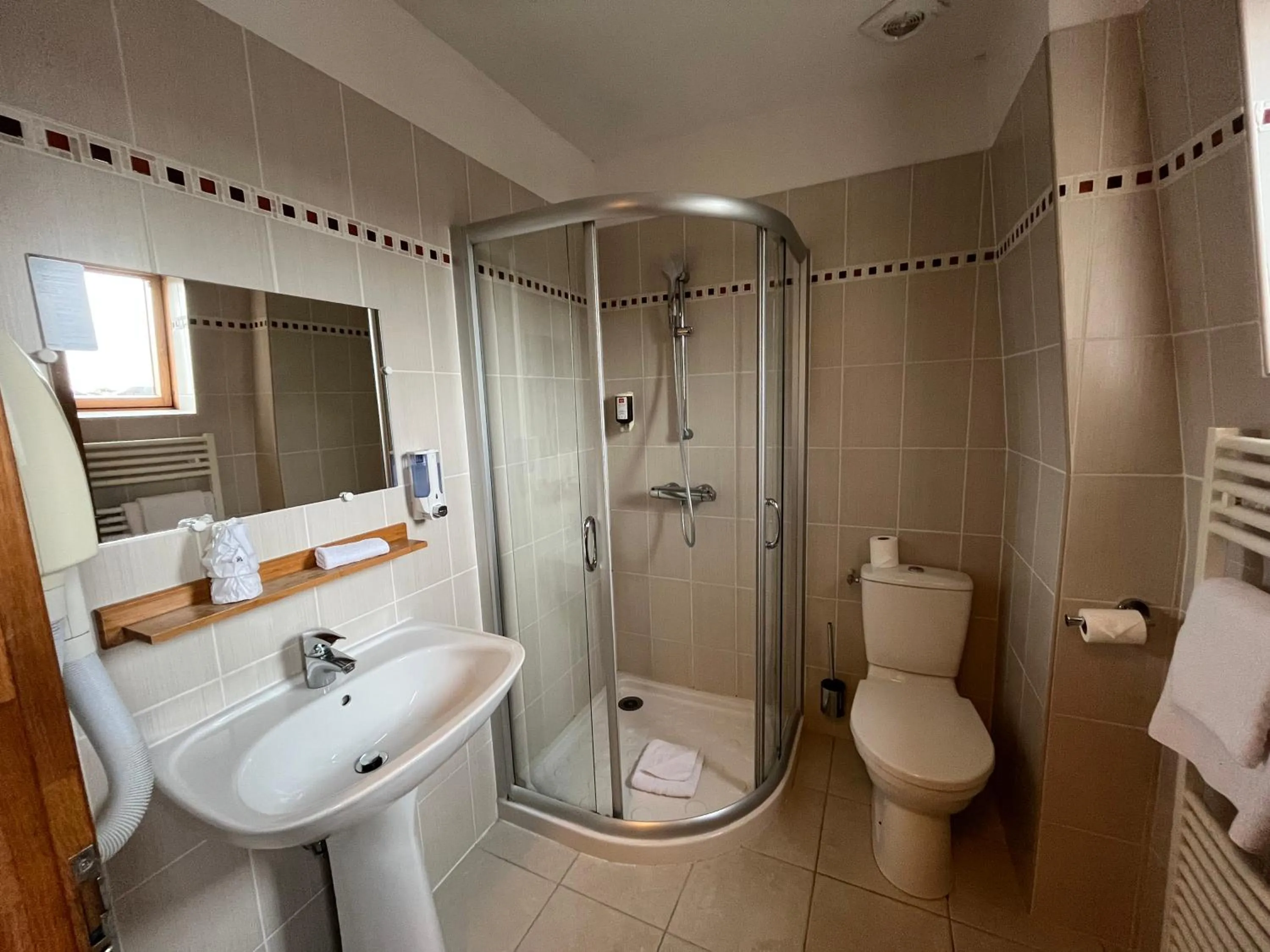 Bathroom in Hôtel & Appartements Le Florence