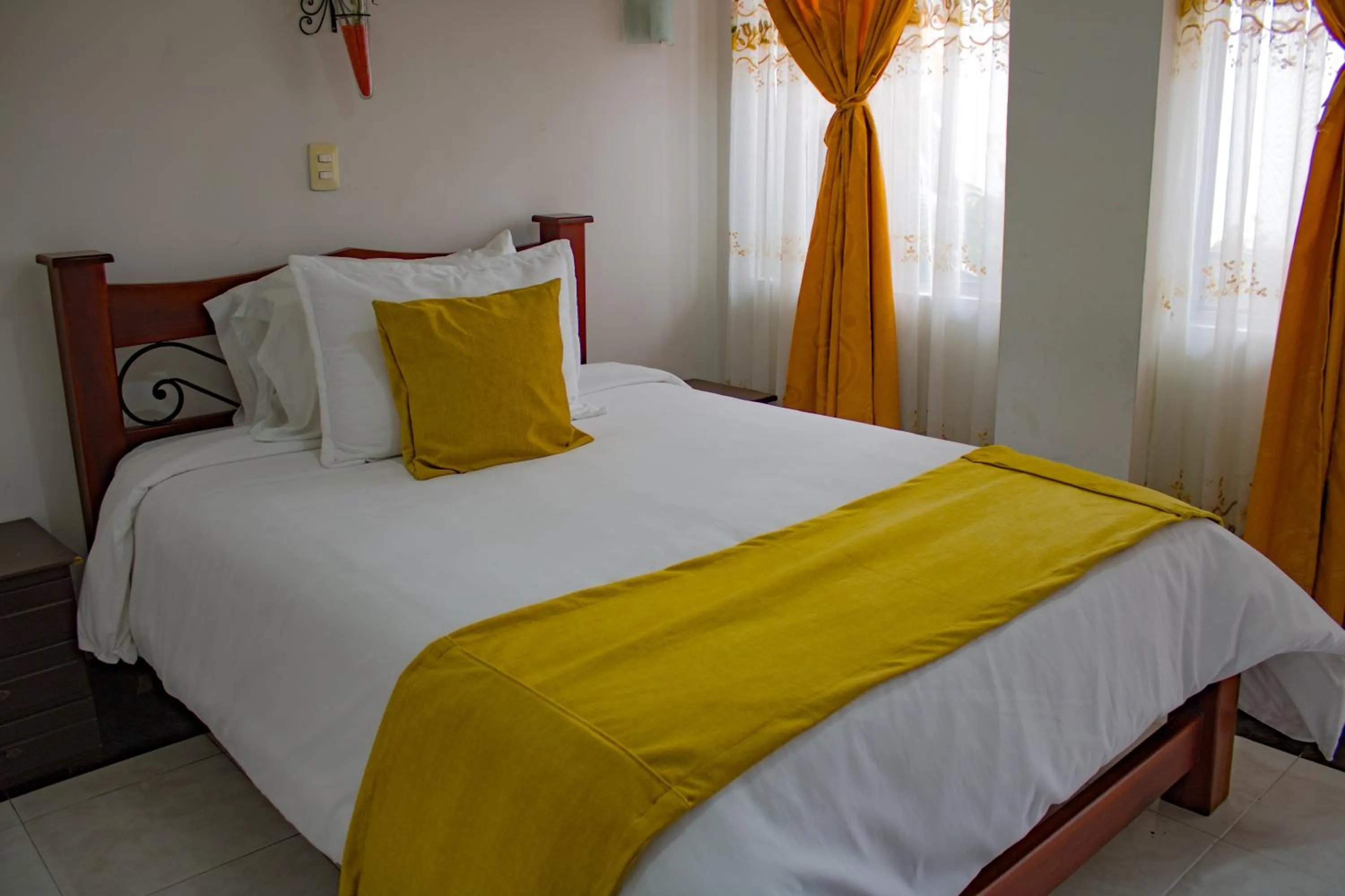 Bed in Hotel Royal Suite