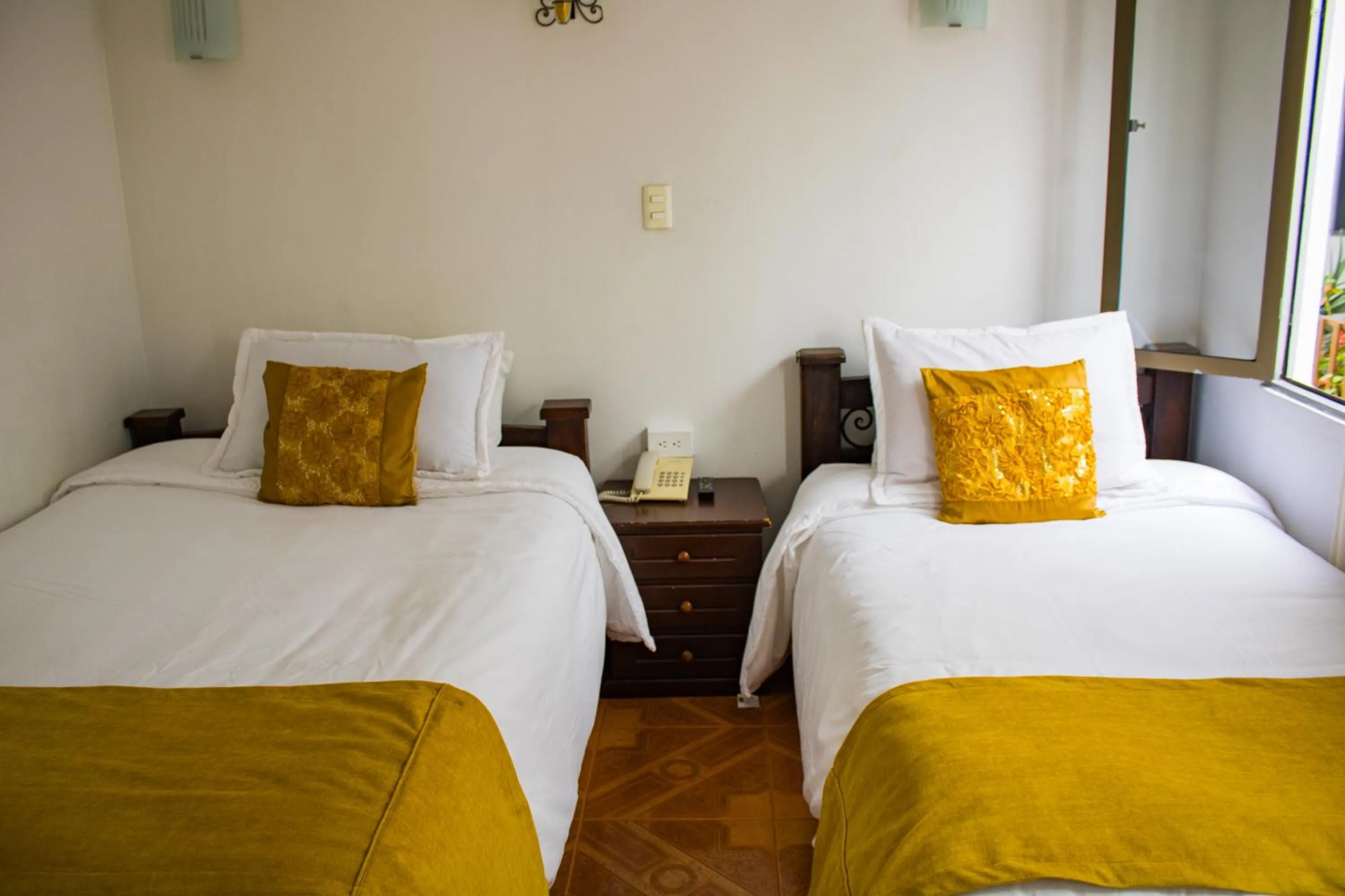 Bed in Hotel Royal Suite