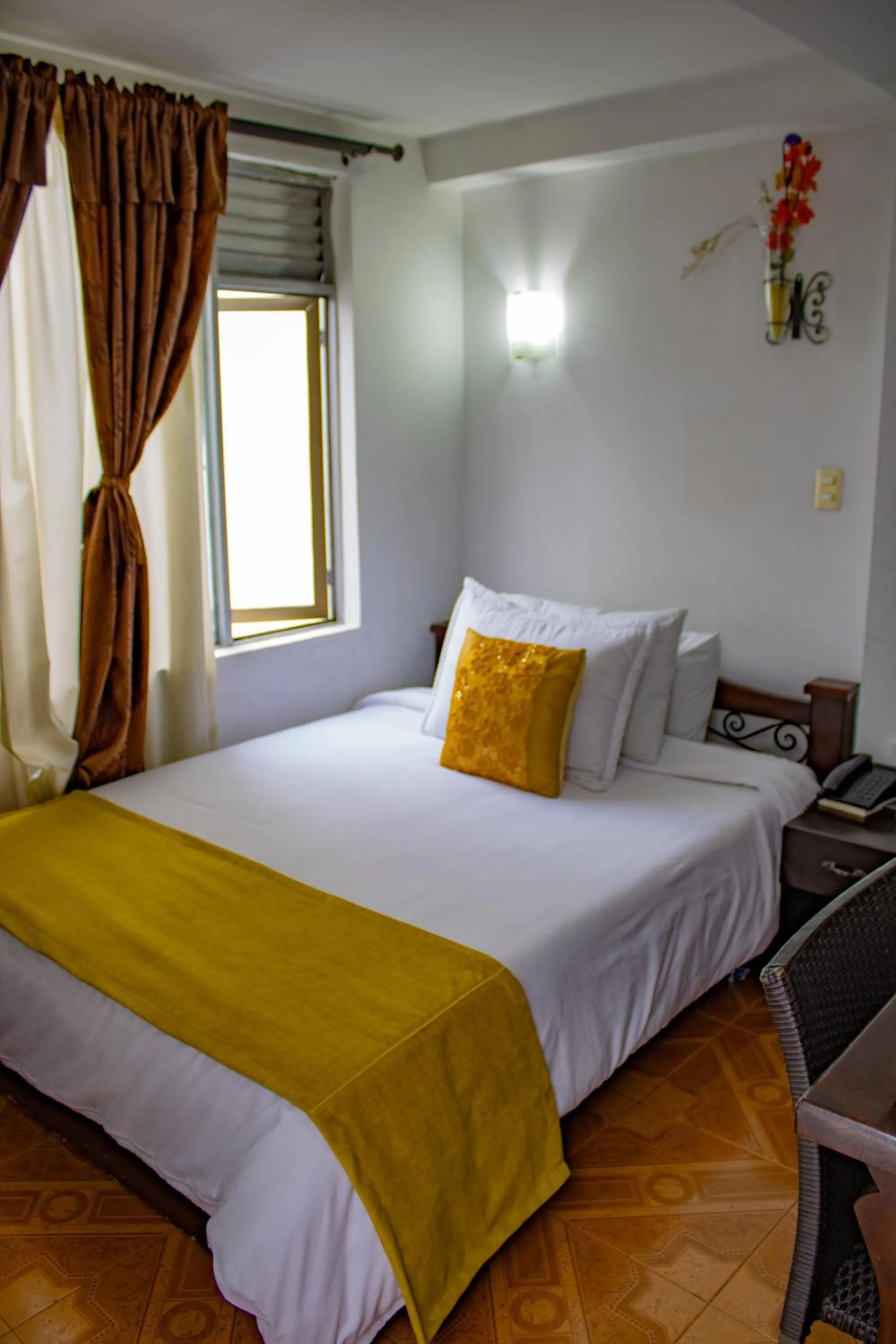 Bed in Hotel Royal Suite