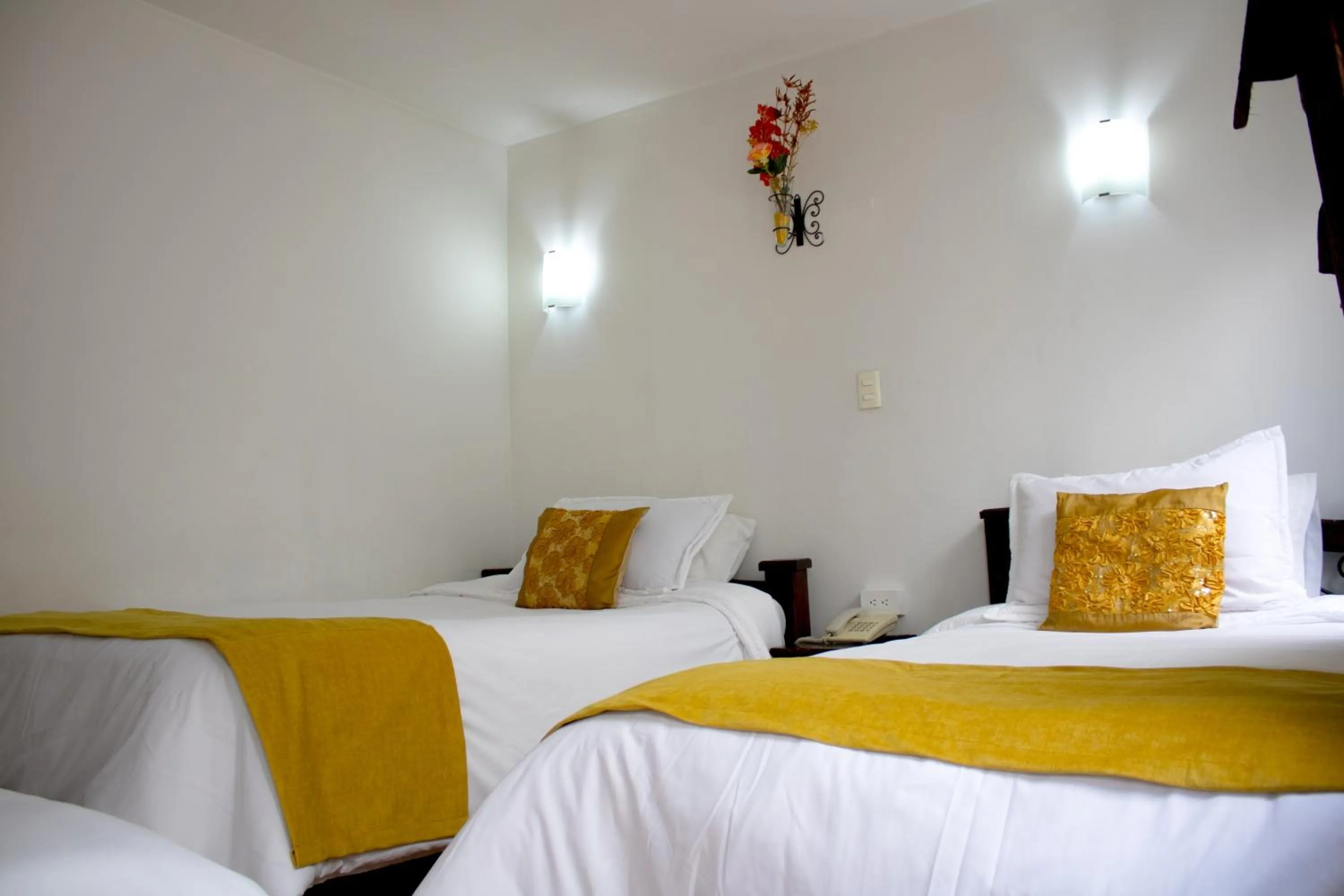 Bed in Hotel Royal Suite