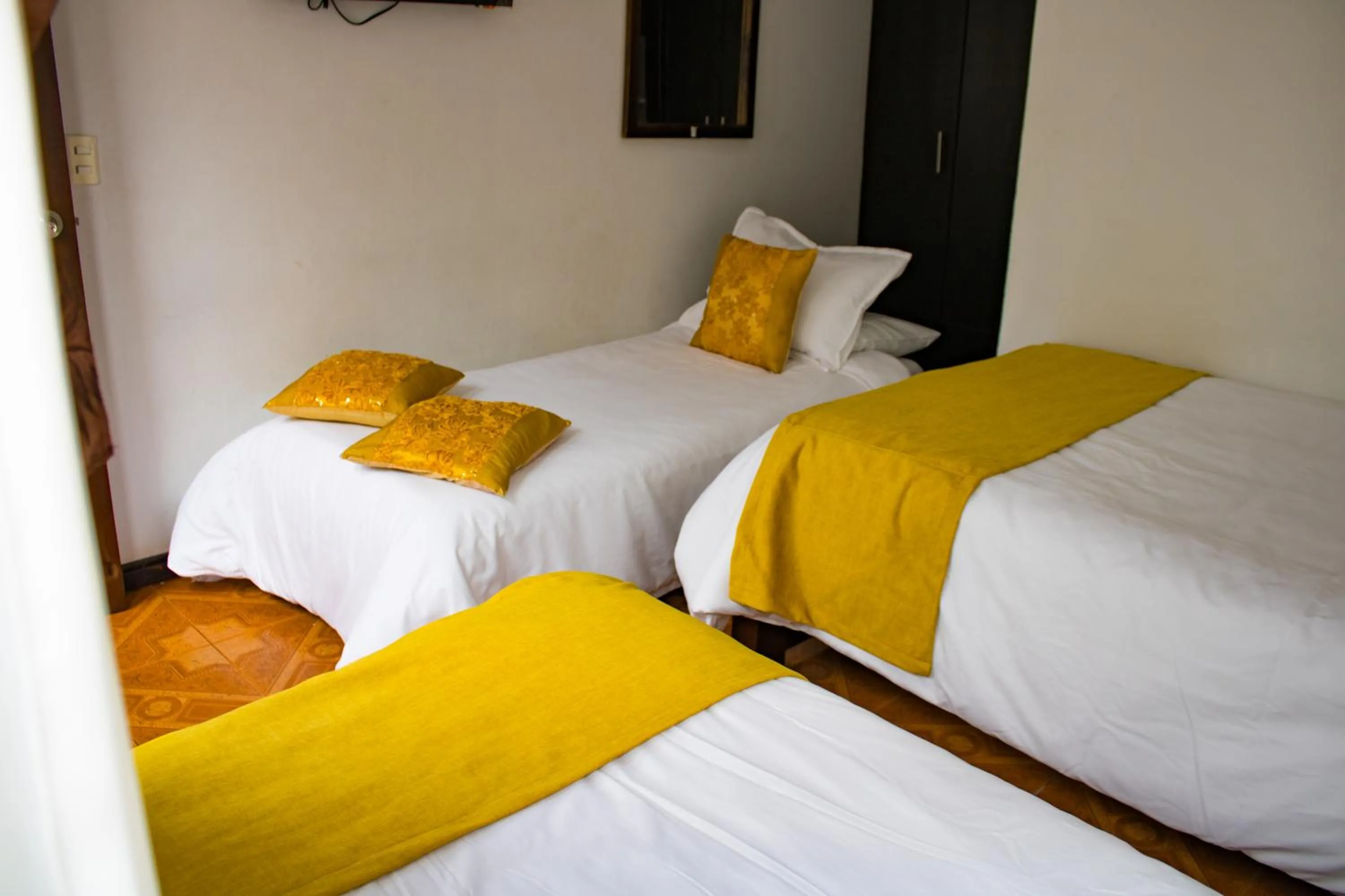 Bed in Hotel Royal Suite