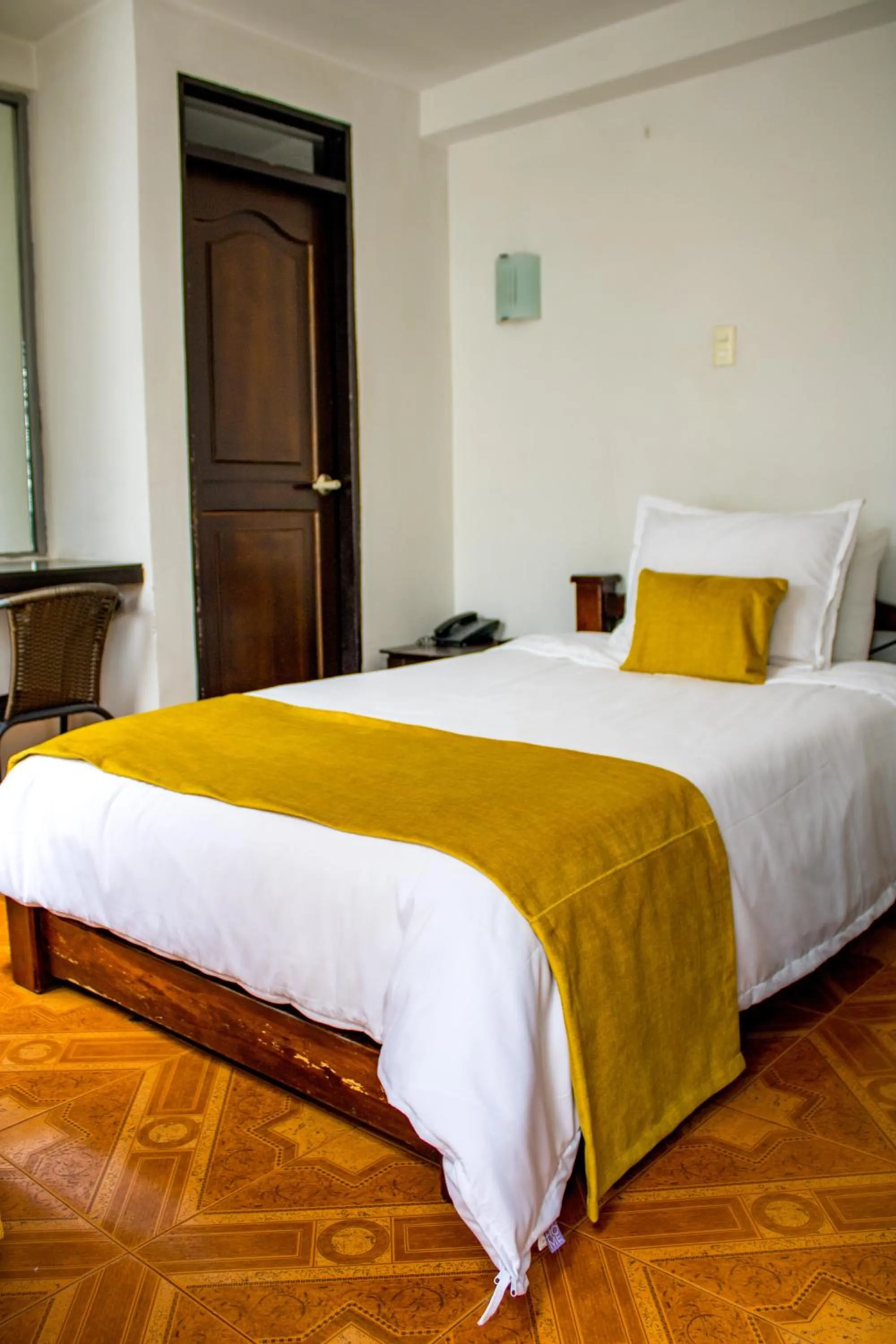 Bed in Hotel Royal Suite