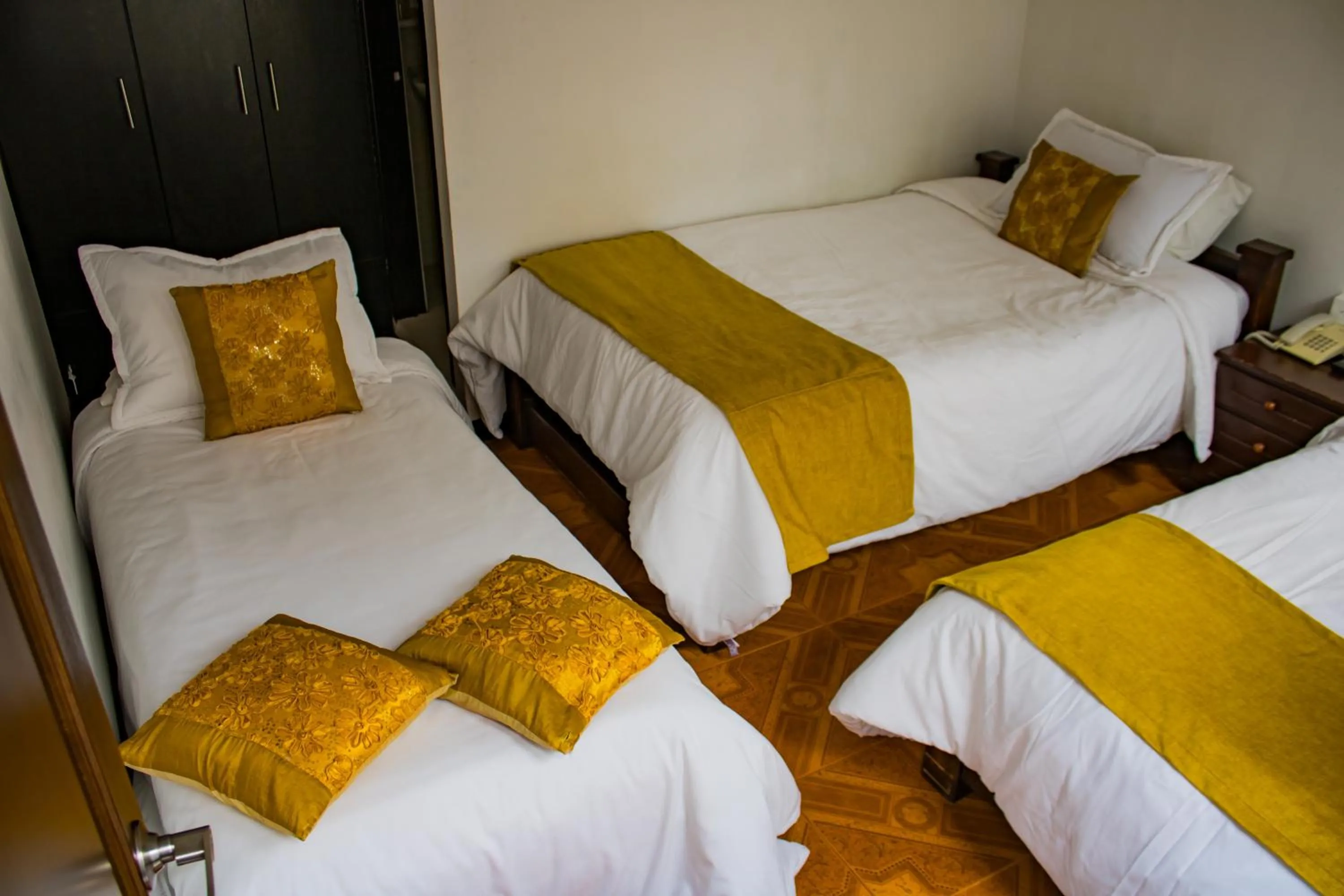 Bed in Hotel Royal Suite