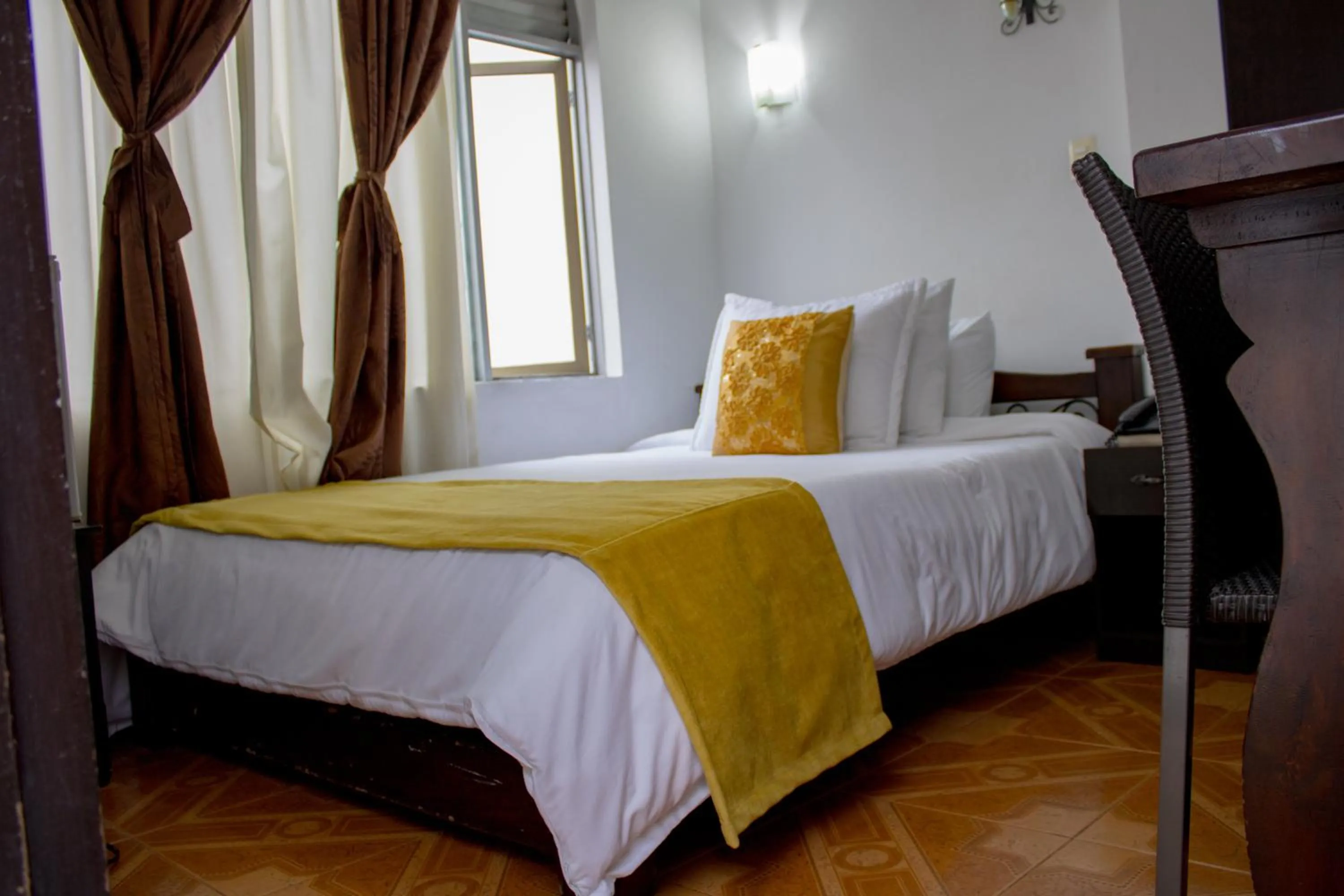 Bed in Hotel Royal Suite