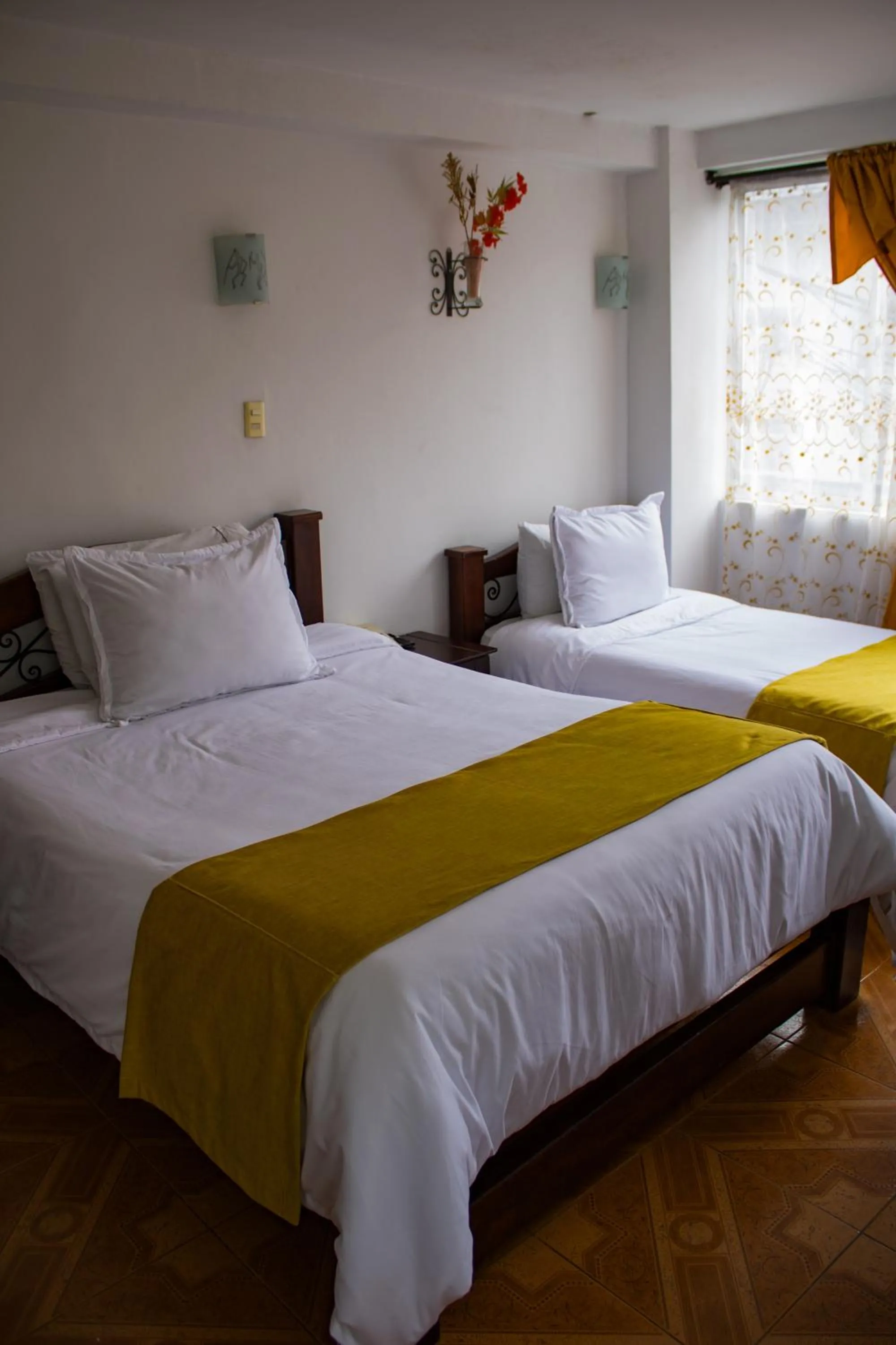 Bed in Hotel Royal Suite