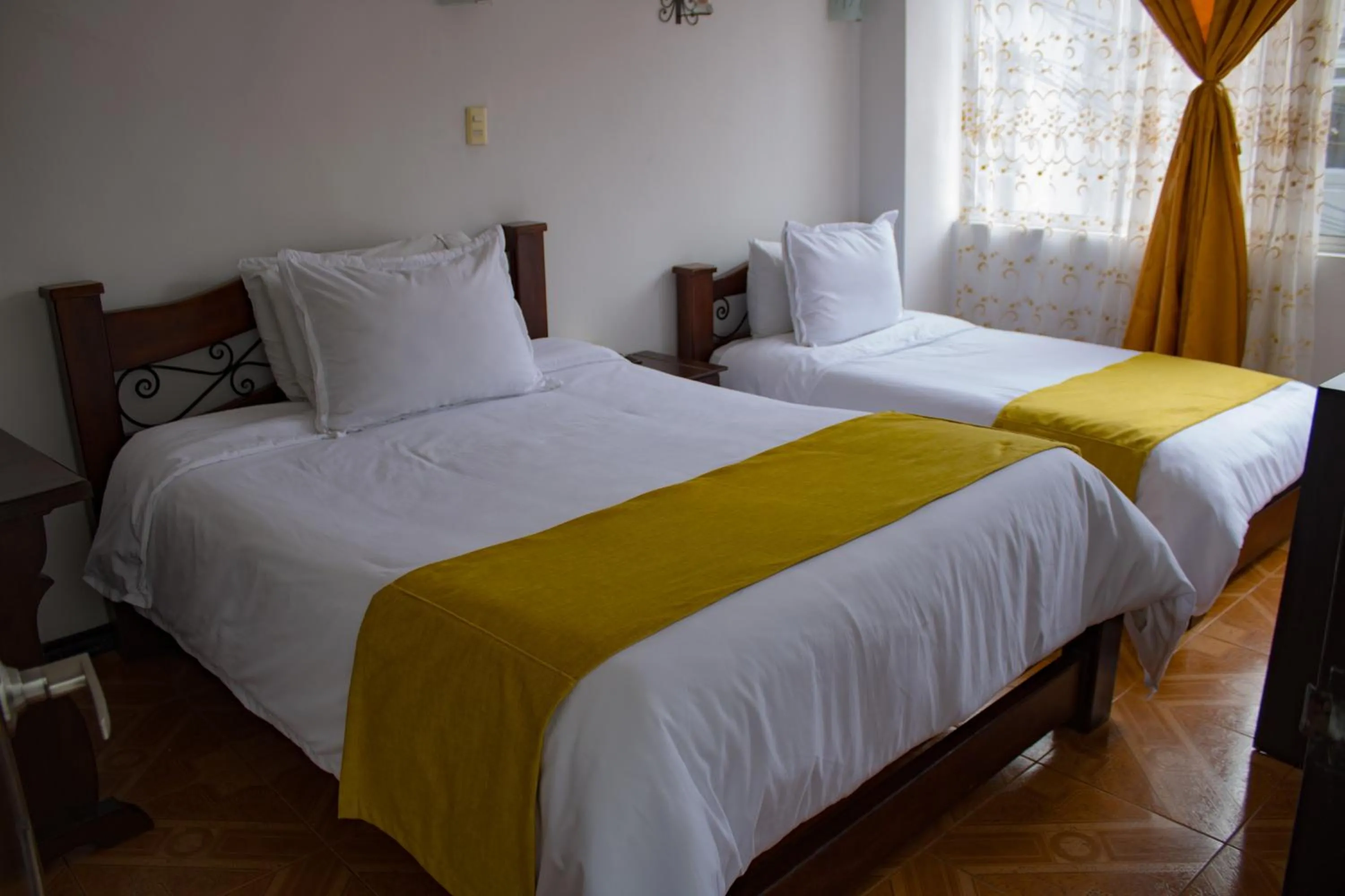 Bed in Hotel Royal Suite