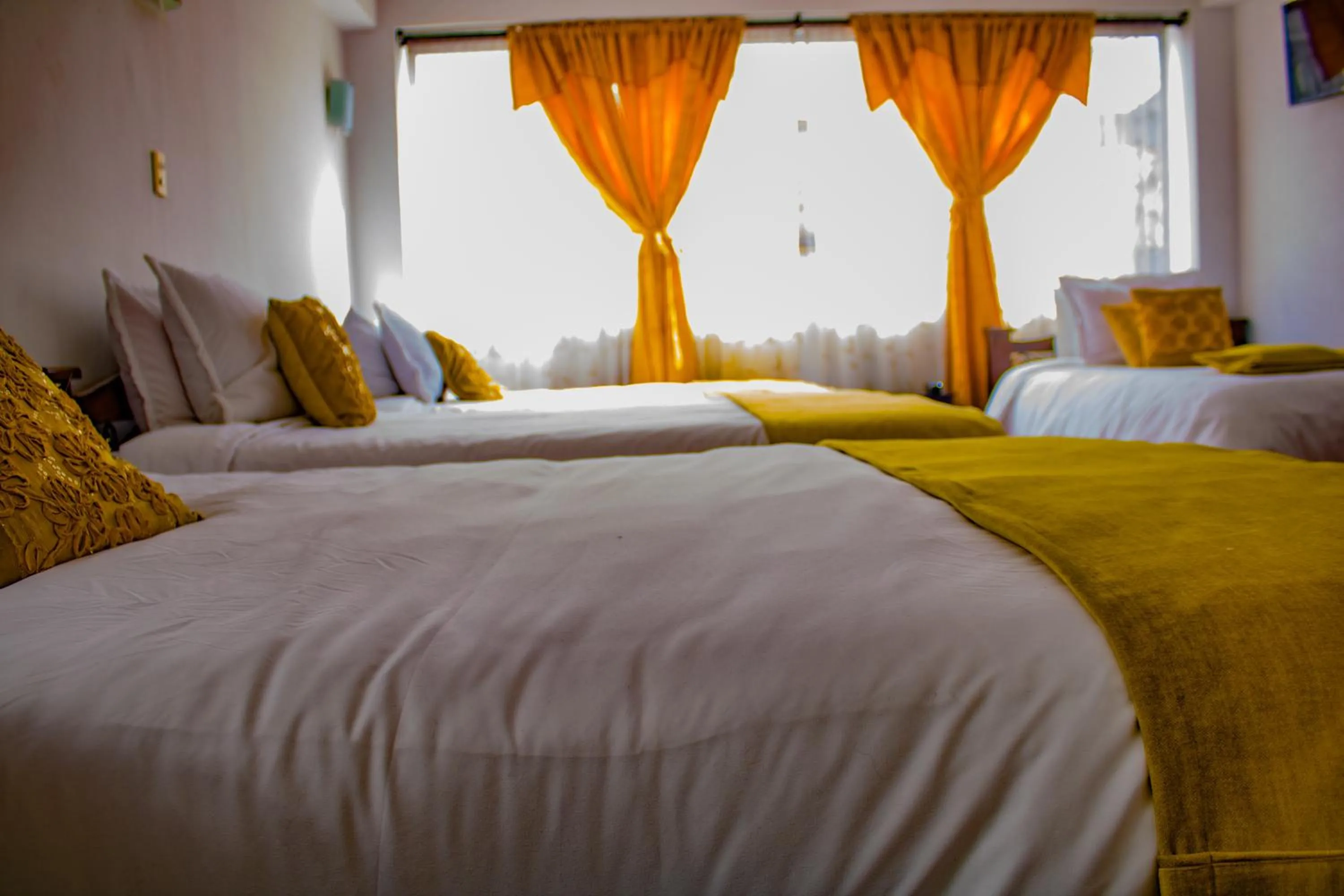 Bed in Hotel Royal Suite