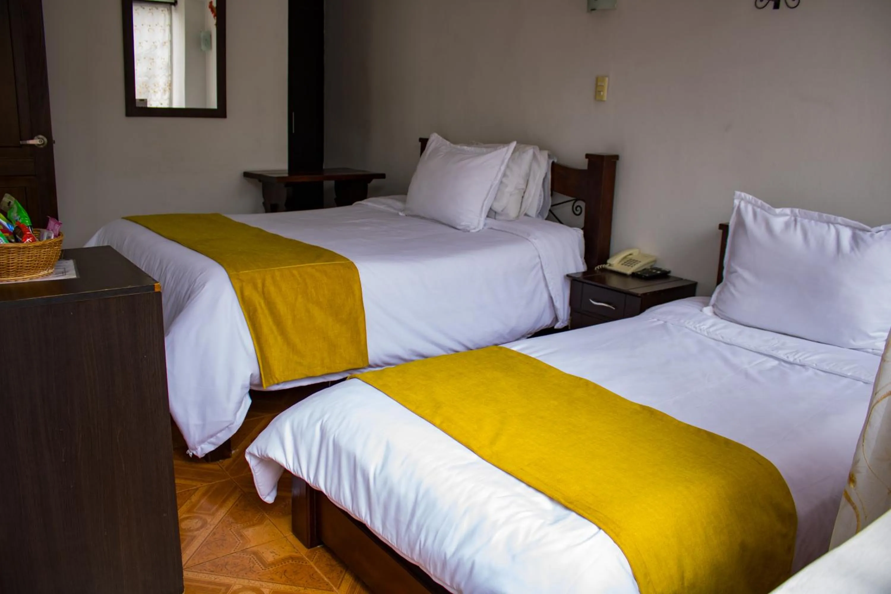 Bed in Hotel Royal Suite