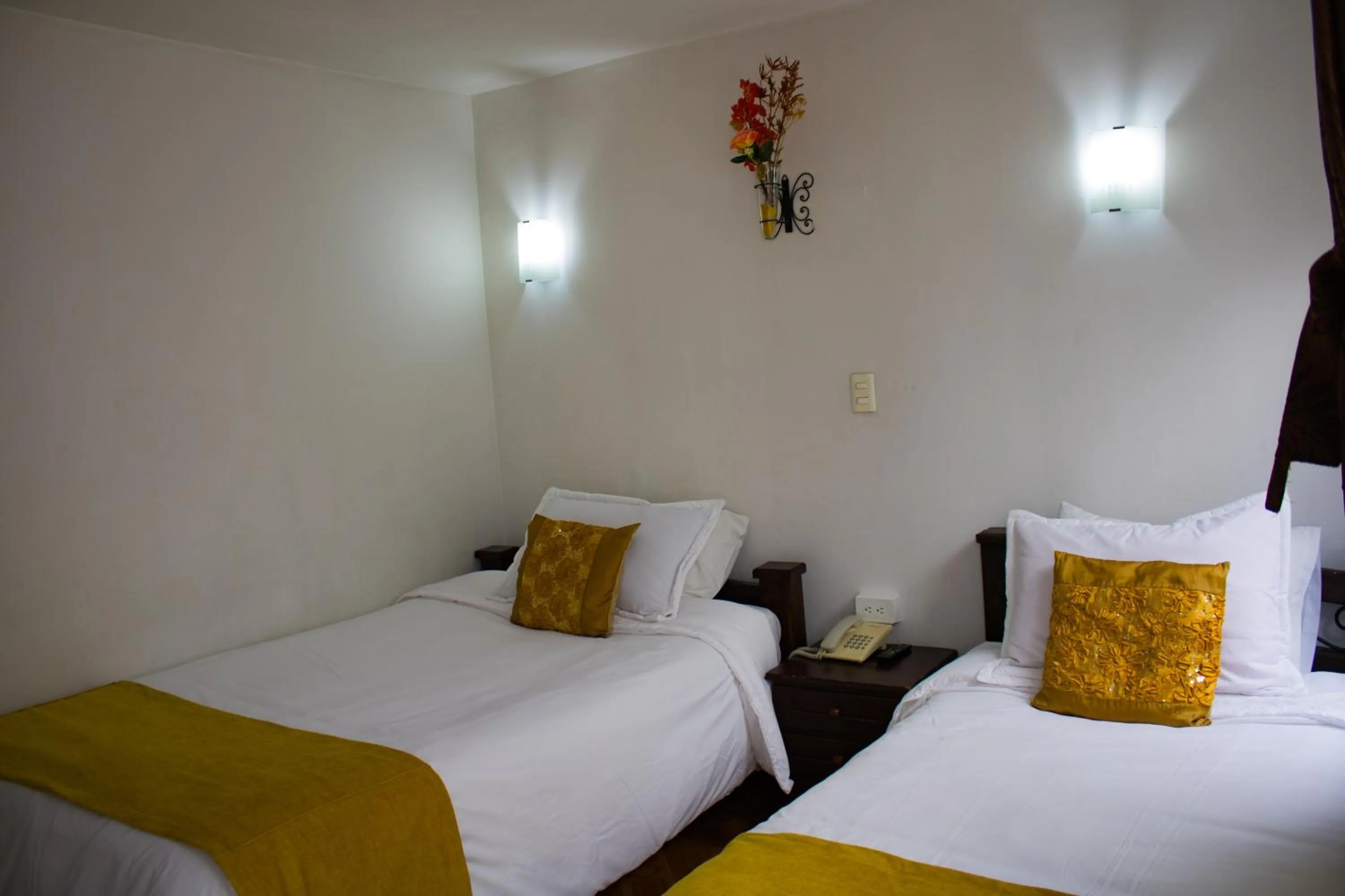 Bed in Hotel Royal Suite