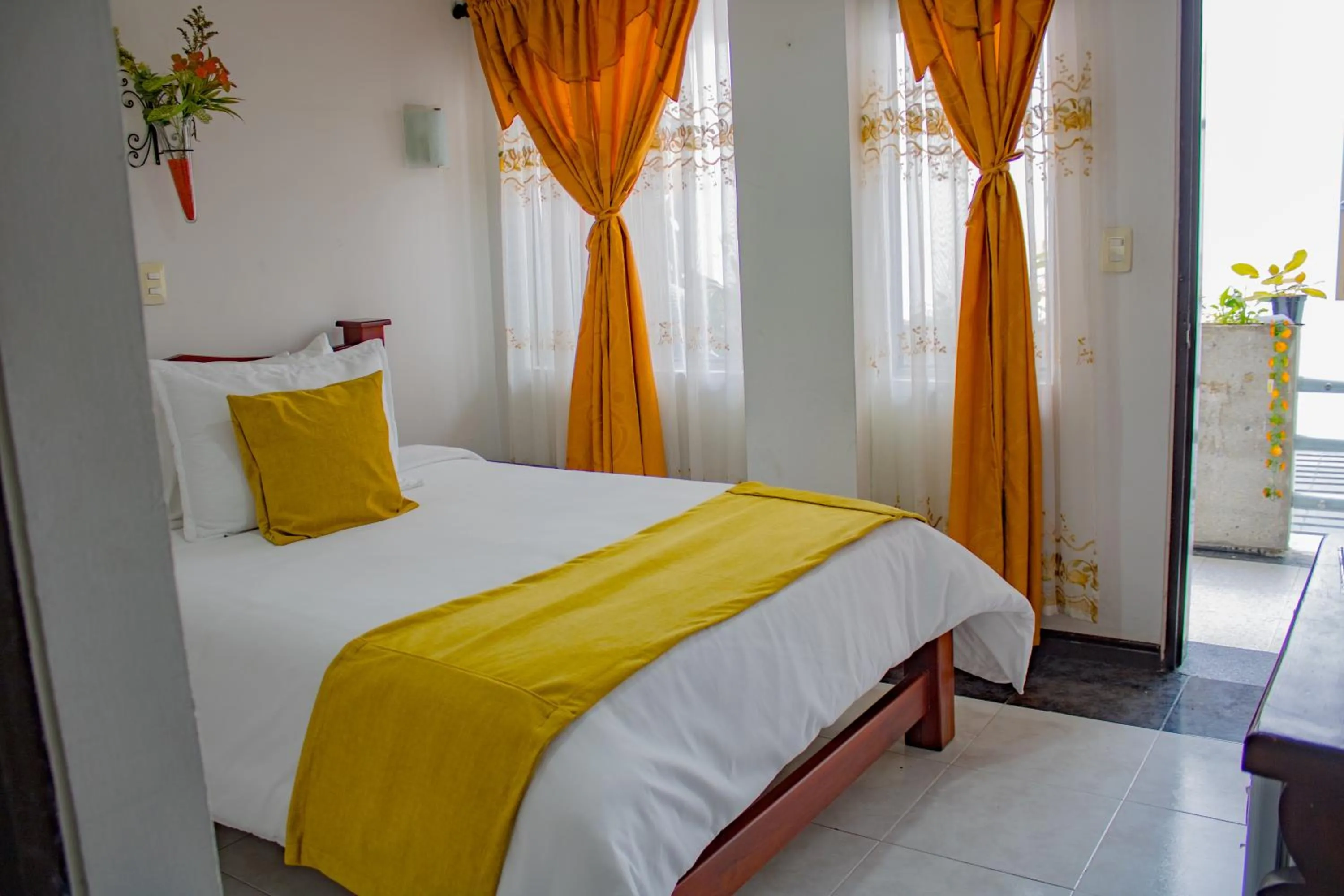 Bed in Hotel Royal Suite