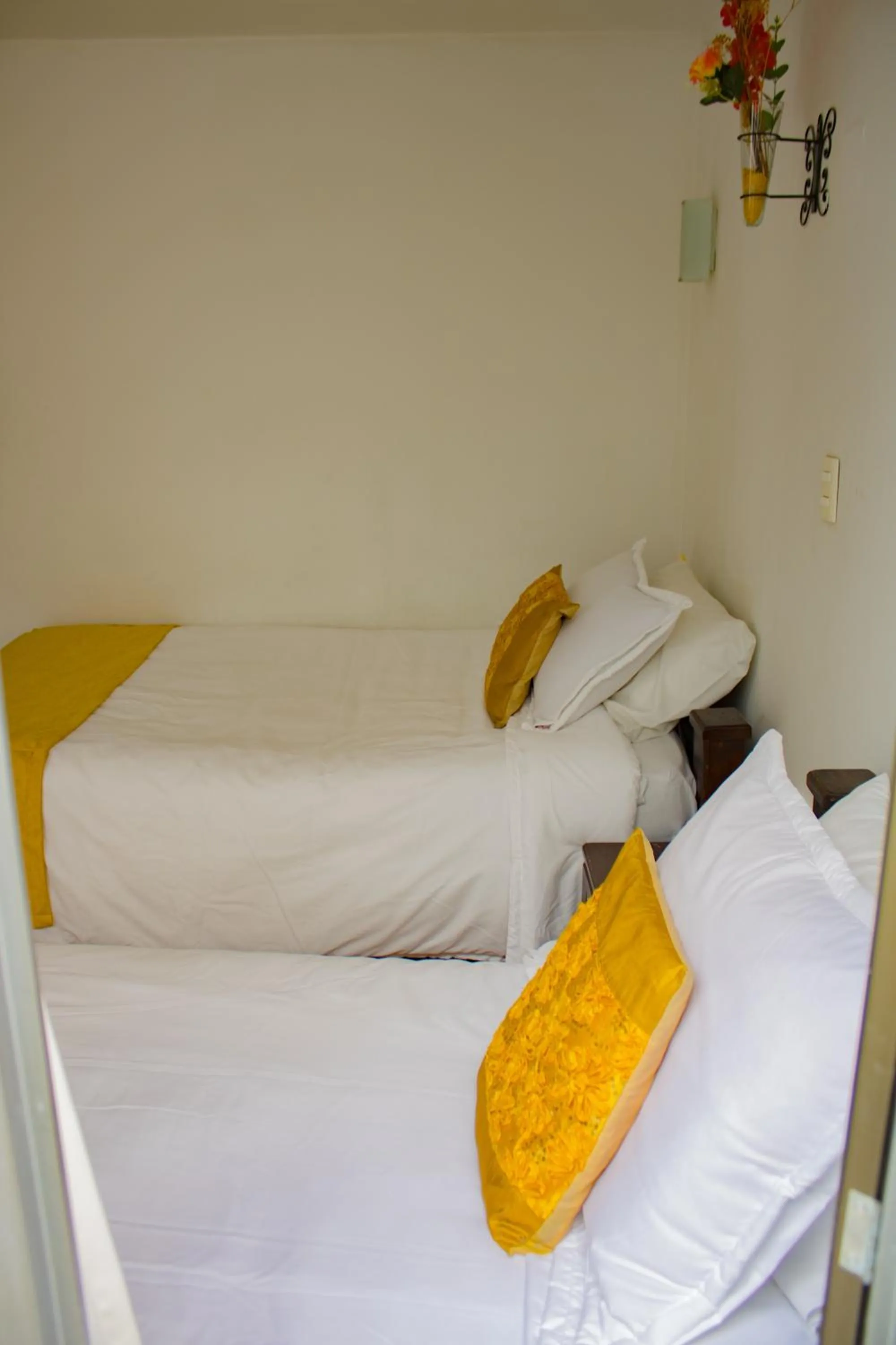Bed in Hotel Royal Suite