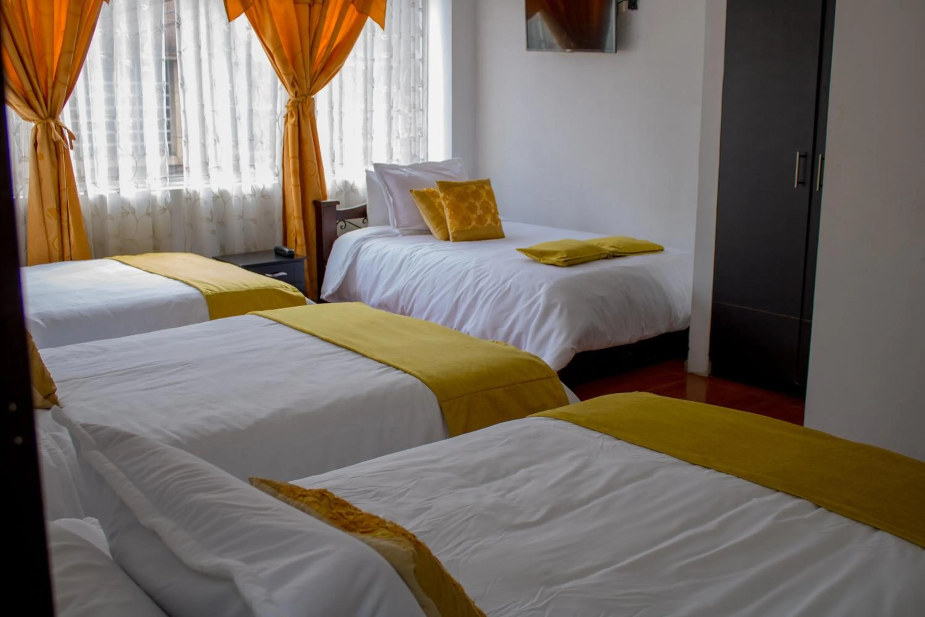 Bed in Hotel Royal Suite