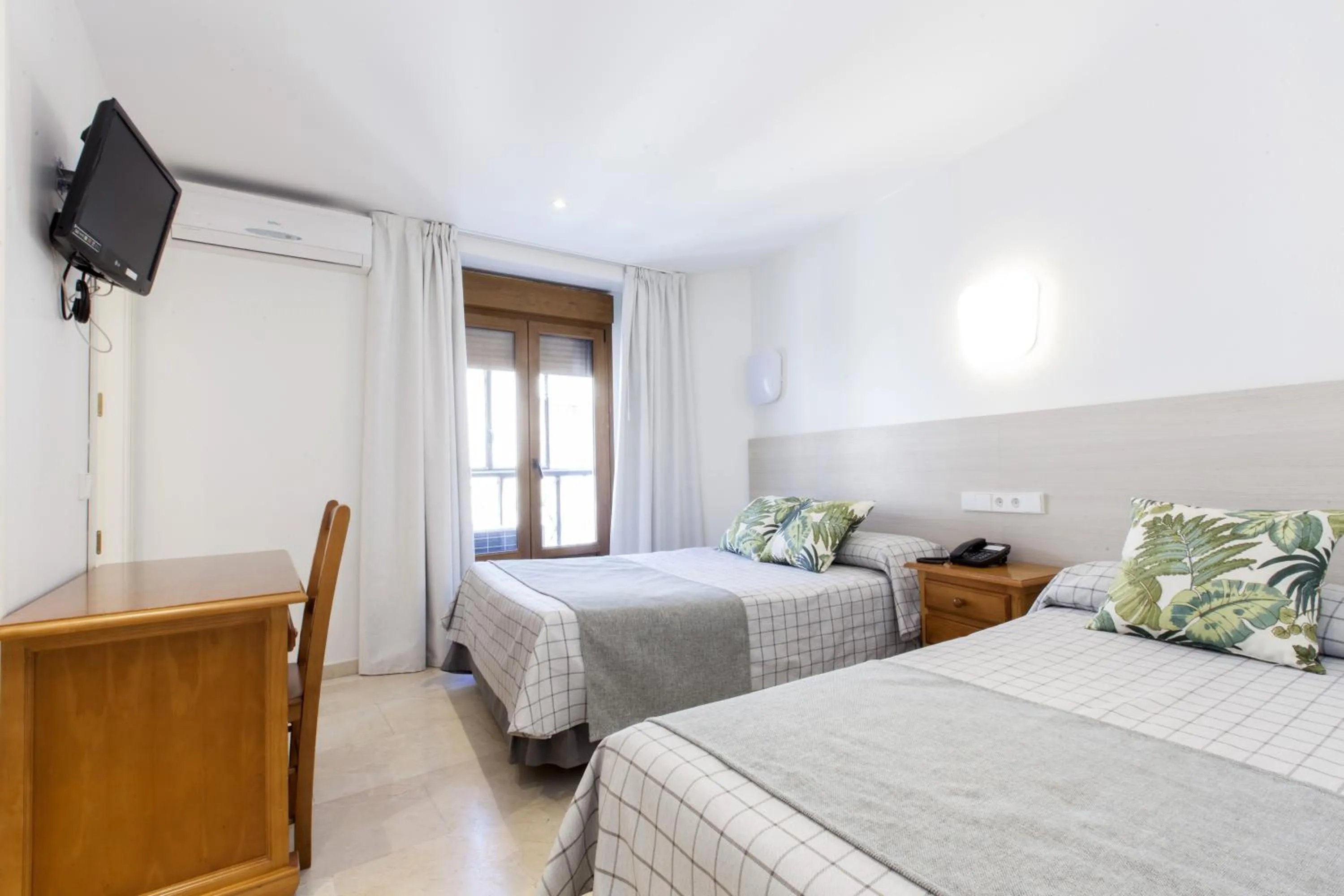 Photo of the whole room, Bed in Hostal Castilla II Puerta del Sol