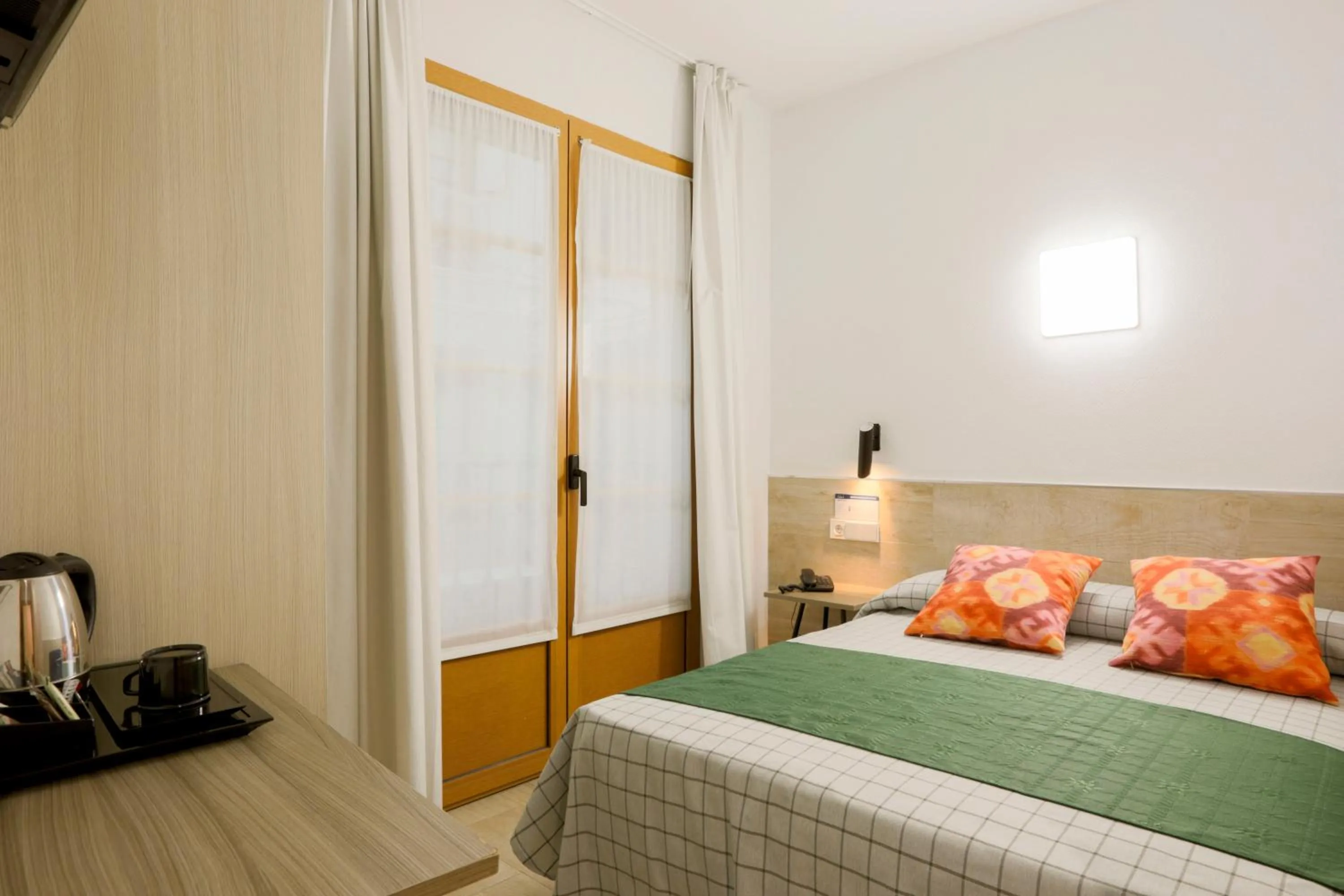 Photo of the whole room, Bed in Hostal Castilla II Puerta del Sol