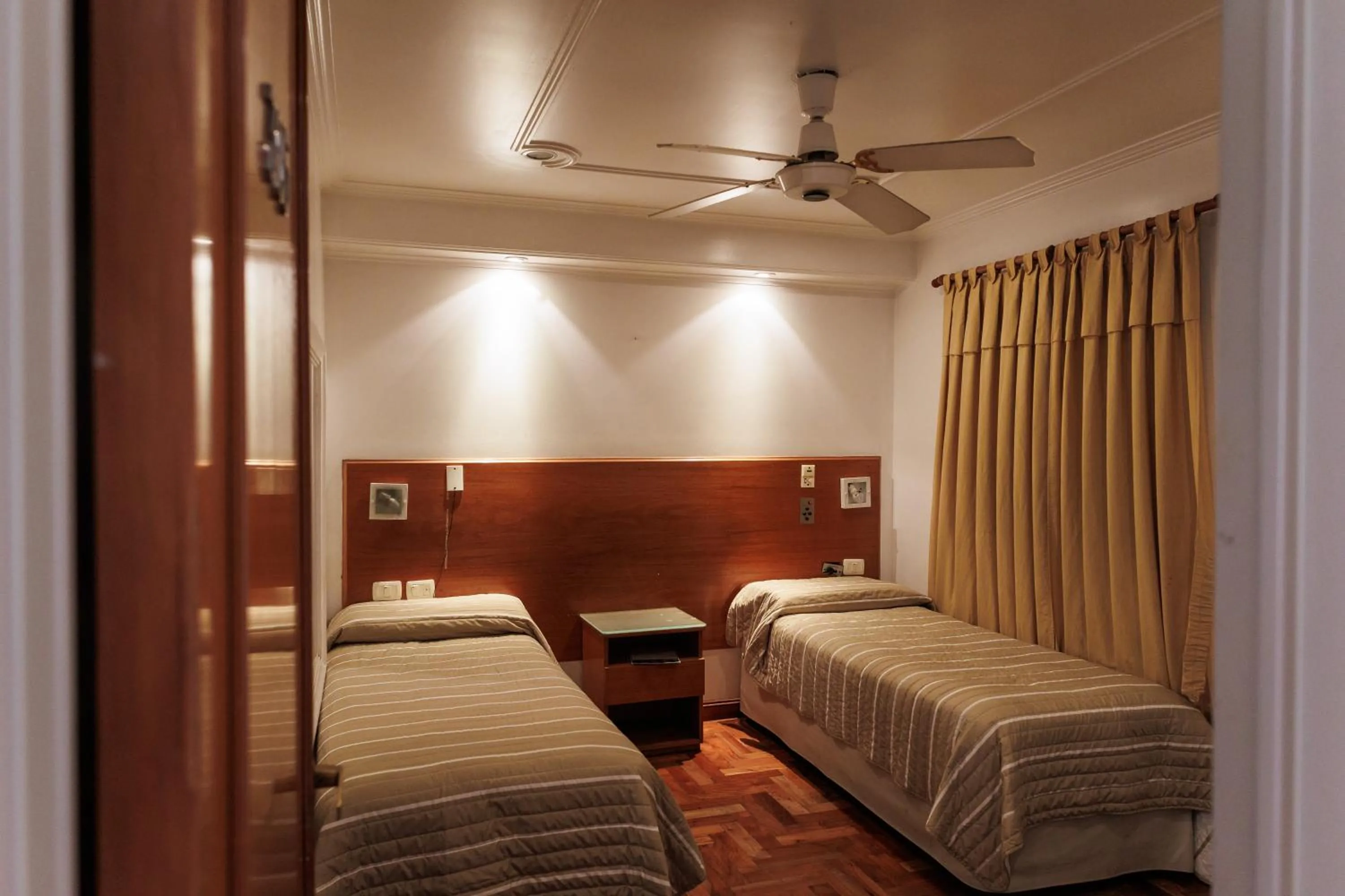 Bed in Hotel Petit Cordoba