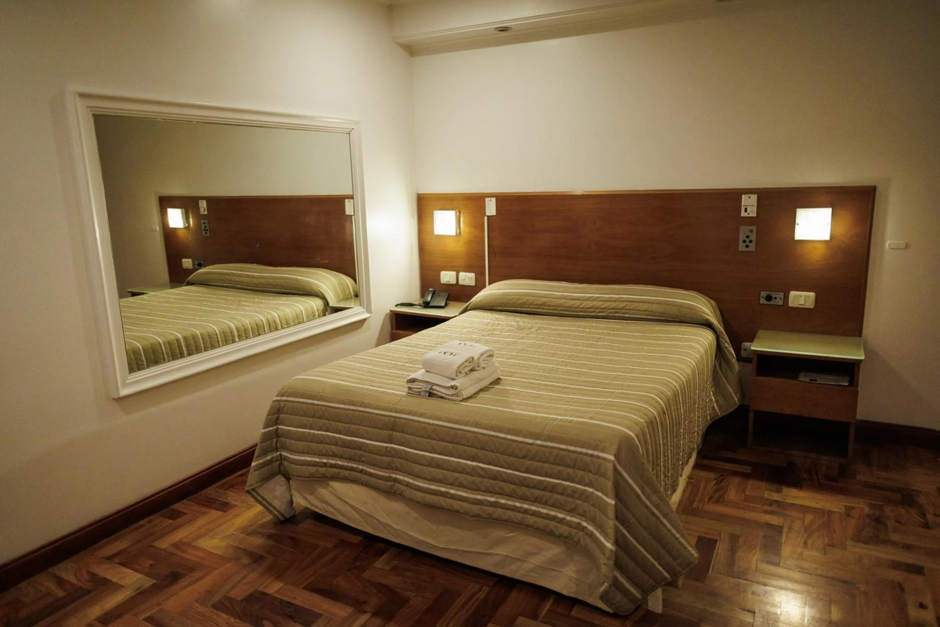 Bed in Hotel Petit Cordoba