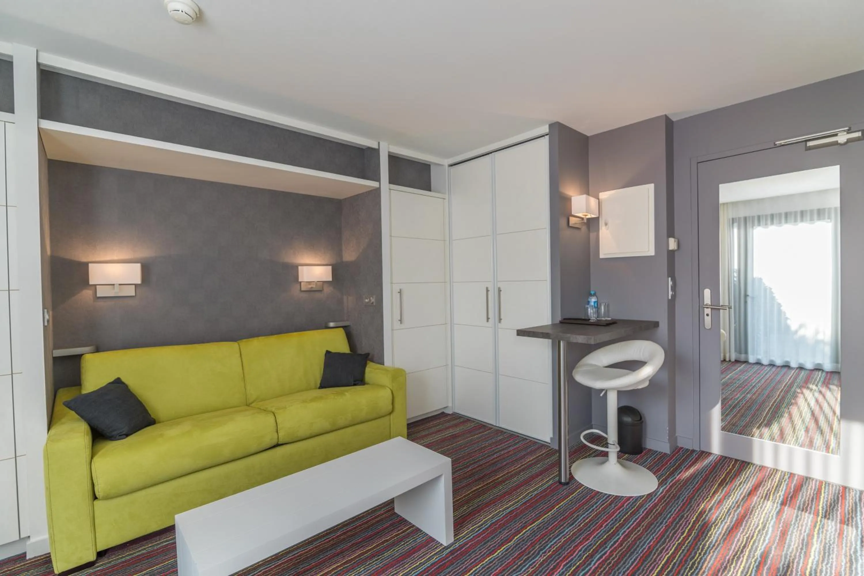 Living room in Logis Hôtel Domaine du Moulin Cavier - Restaurants & Spa