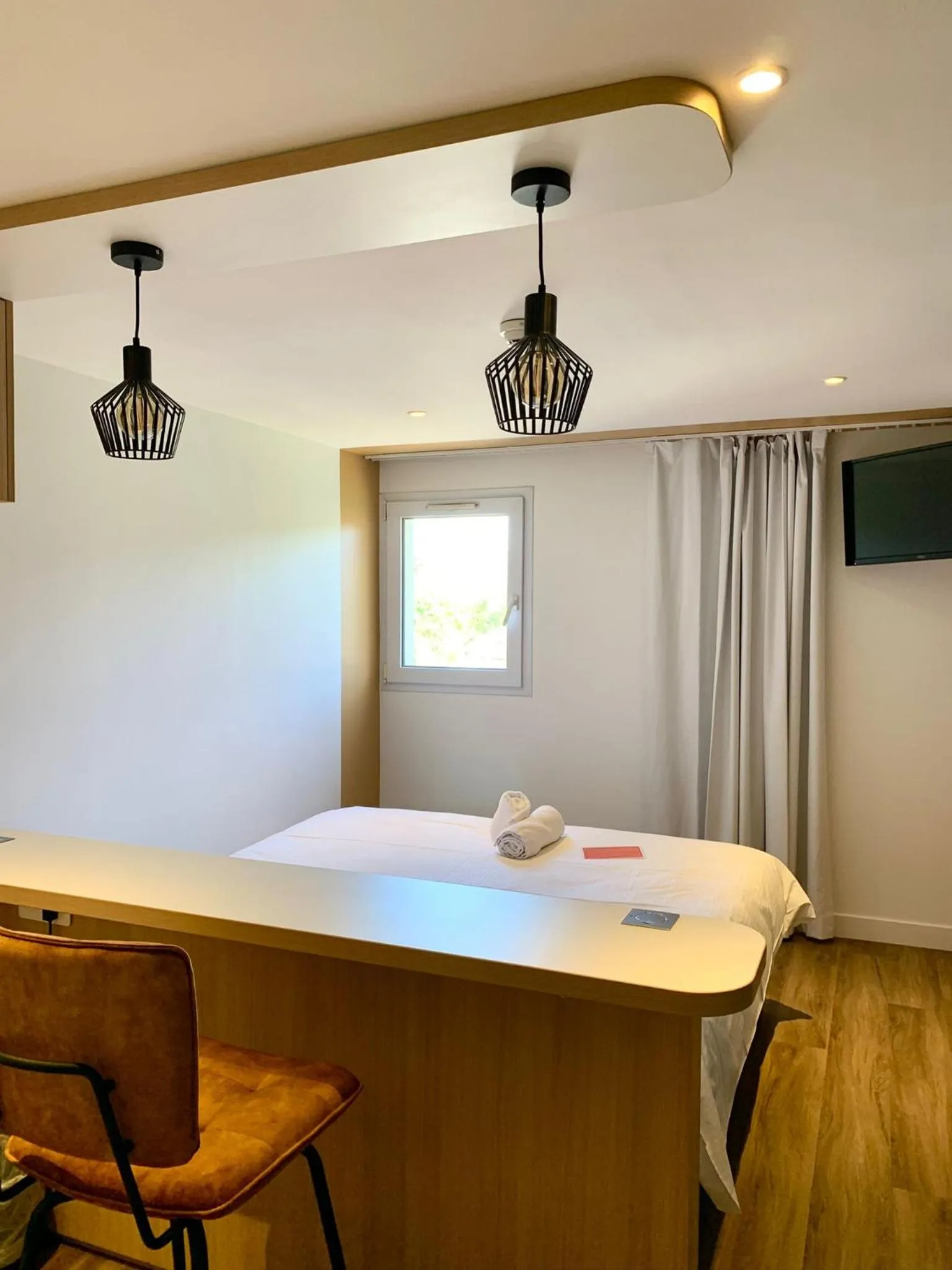 Bed in Logis Hôtel Domaine du Moulin Cavier - Restaurants & Spa