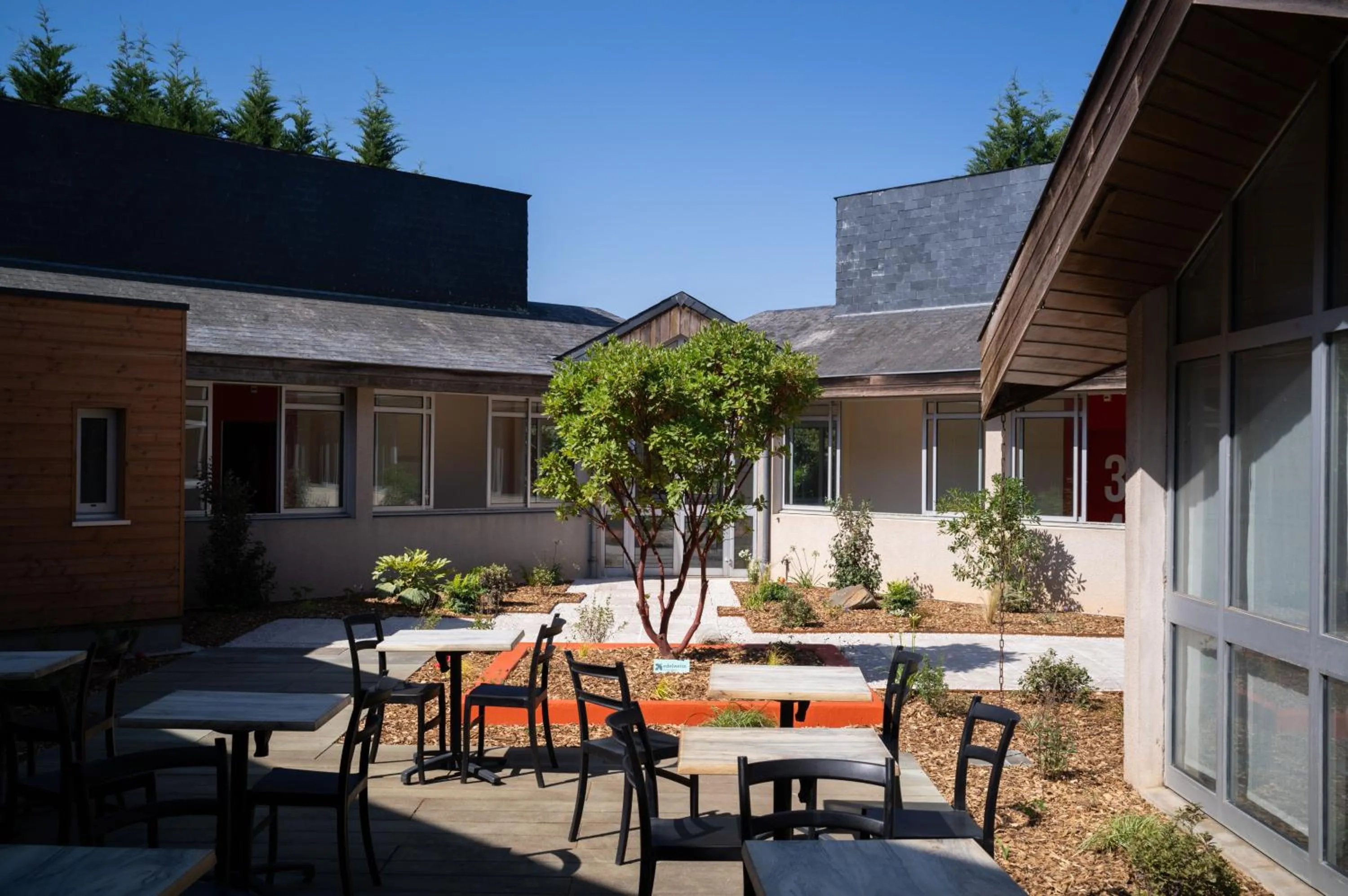 Patio in Logis Hôtel Domaine du Moulin Cavier - Restaurants & Spa