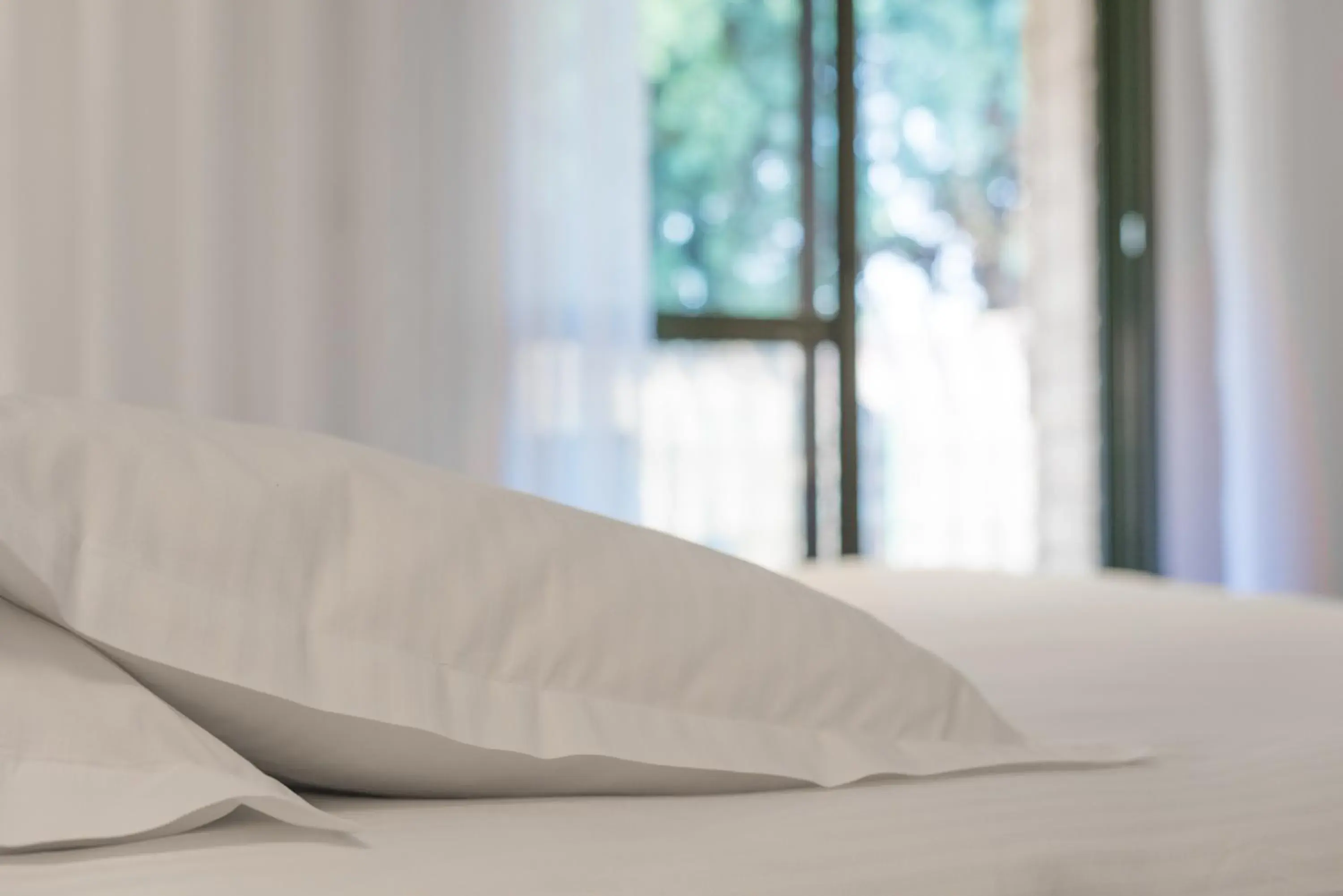 Bed in Logis Hôtel Domaine du Moulin Cavier - Restaurants & Spa Bed in Logis Hôtel Domaine du Moulin Cavier - Restaurants & Spa