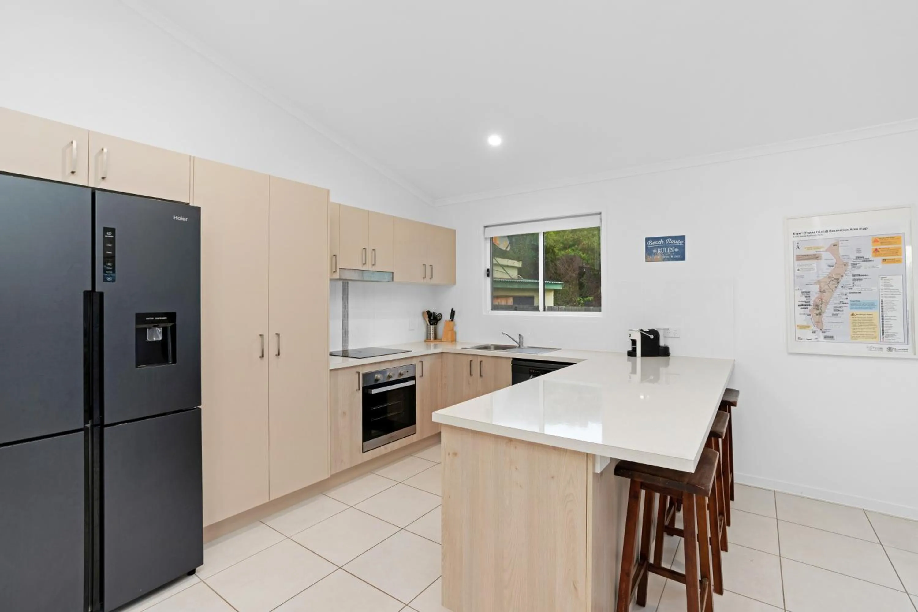 Kitchen or kitchenette in K'gari Beach Houses