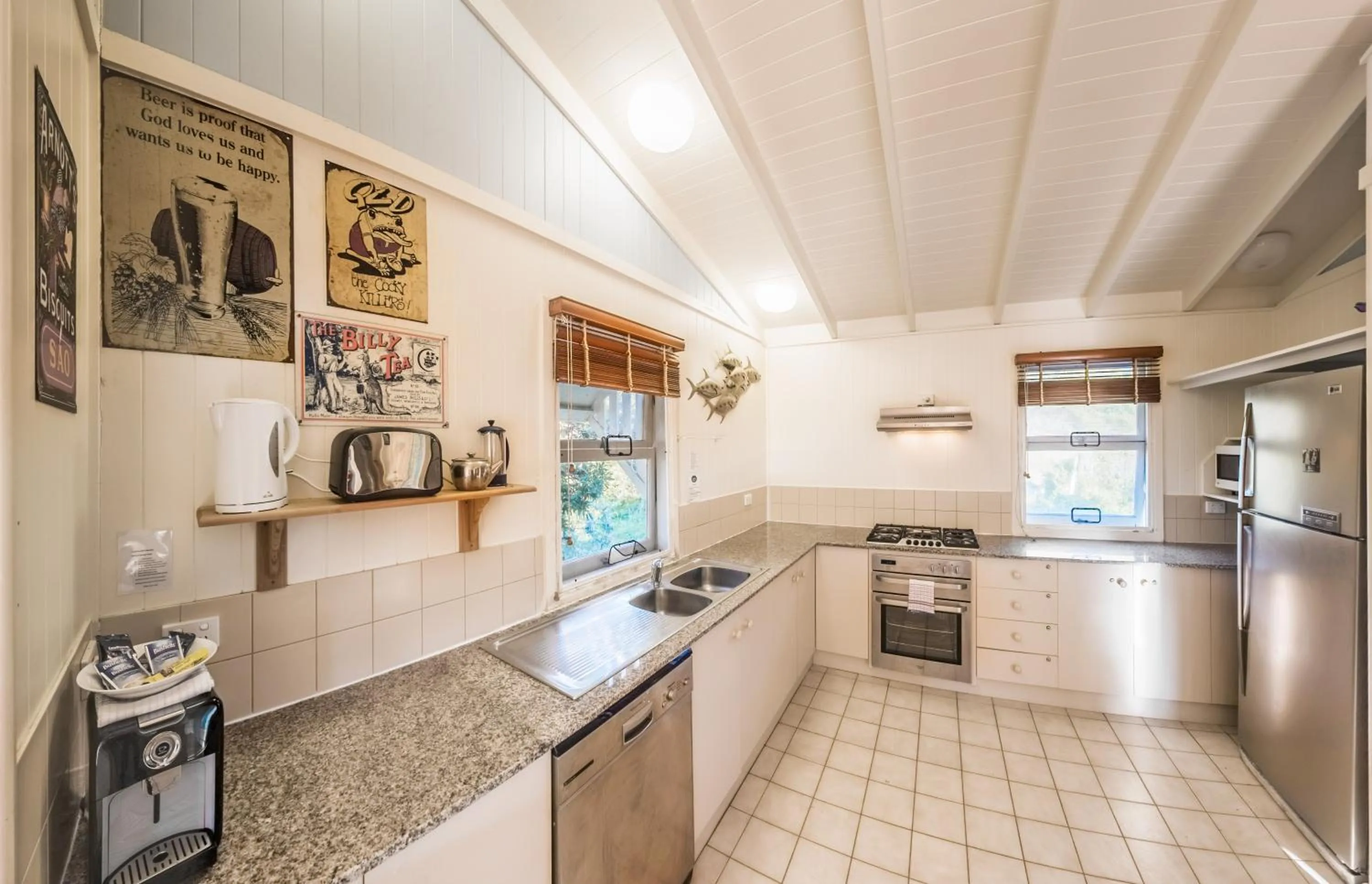 Kitchen or kitchenette in K'gari Beach Houses